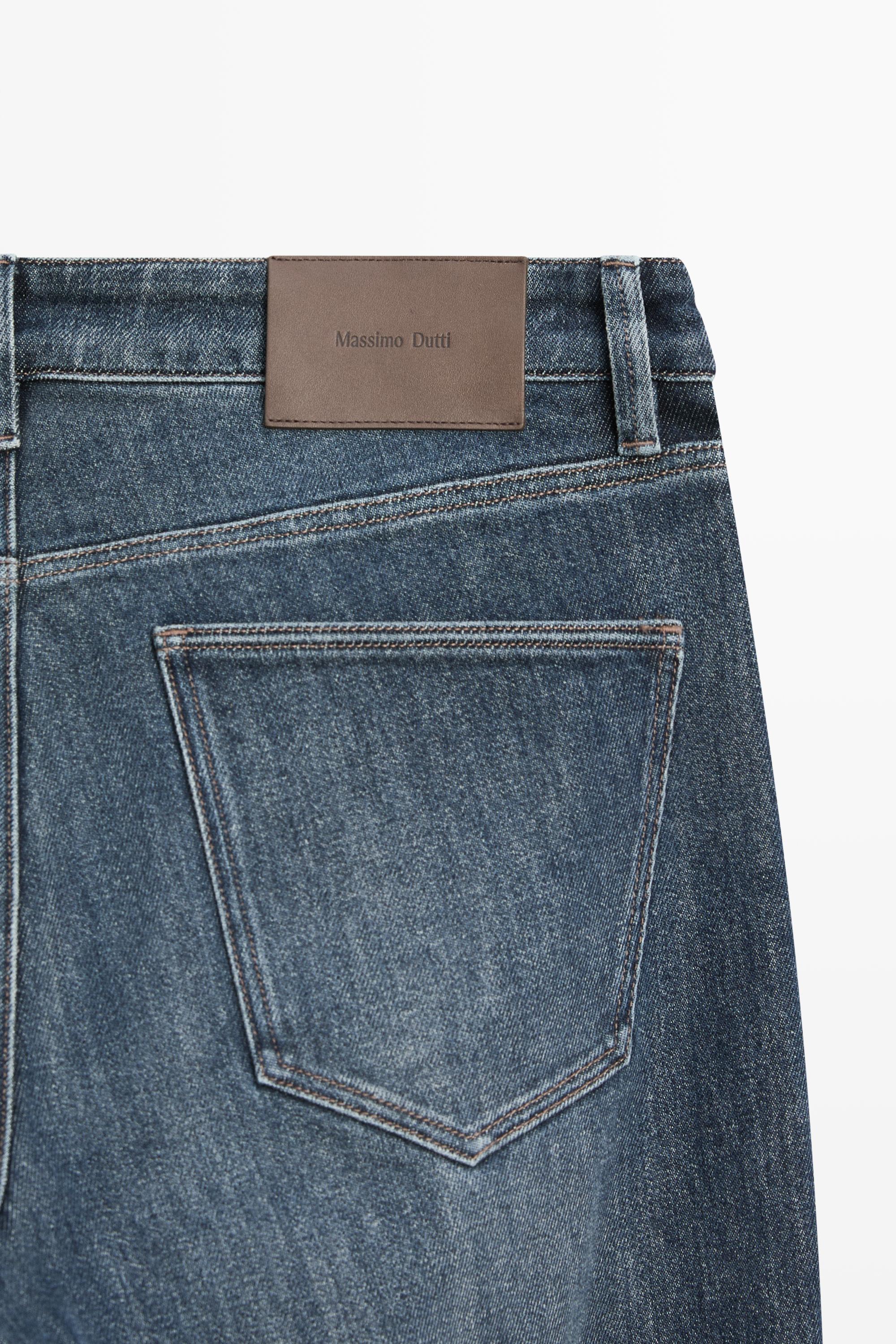 Enzymatic tapered fit jeans — DEEP BLUE