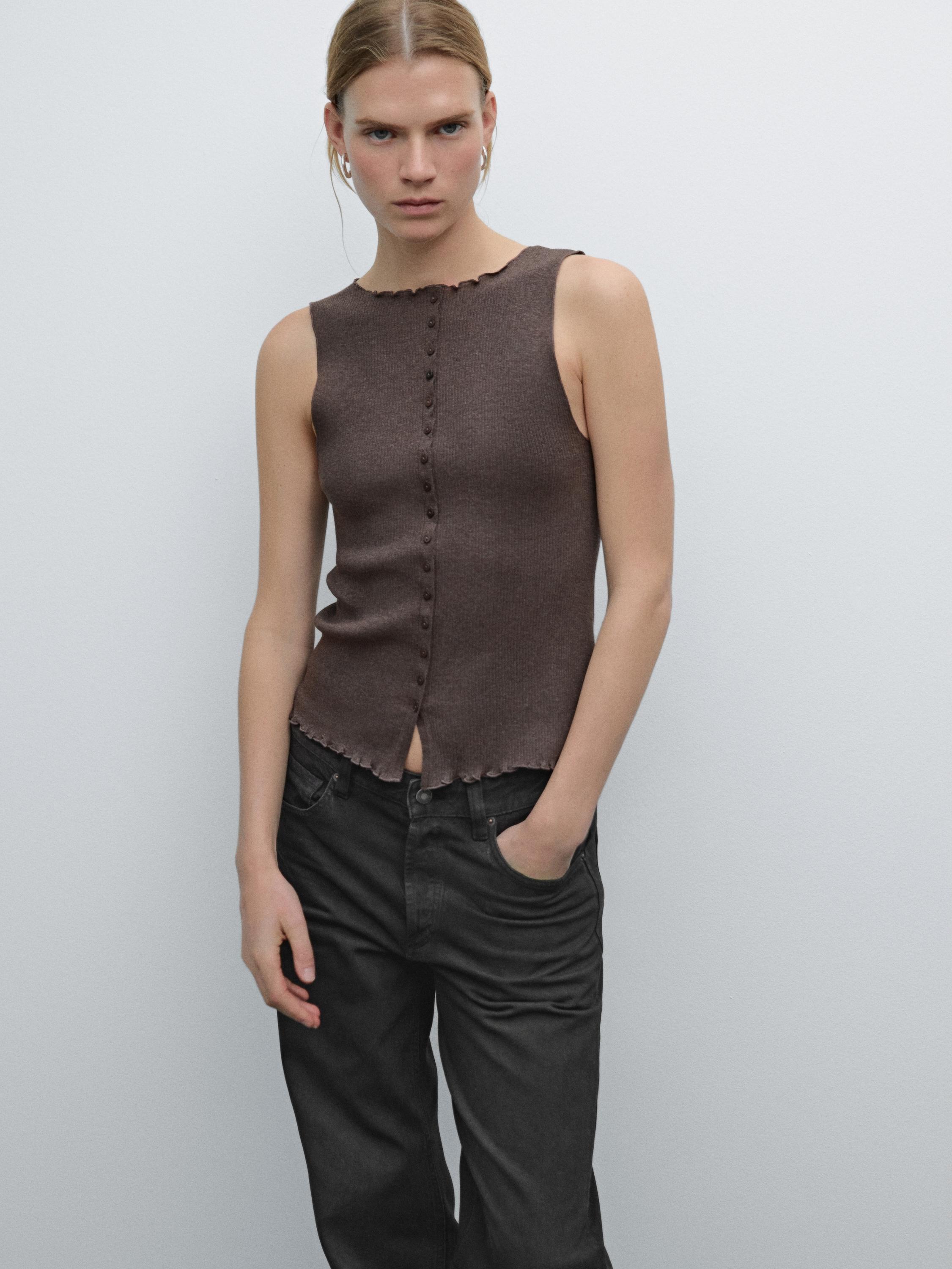 Knit waistcoat top with buttoned strap