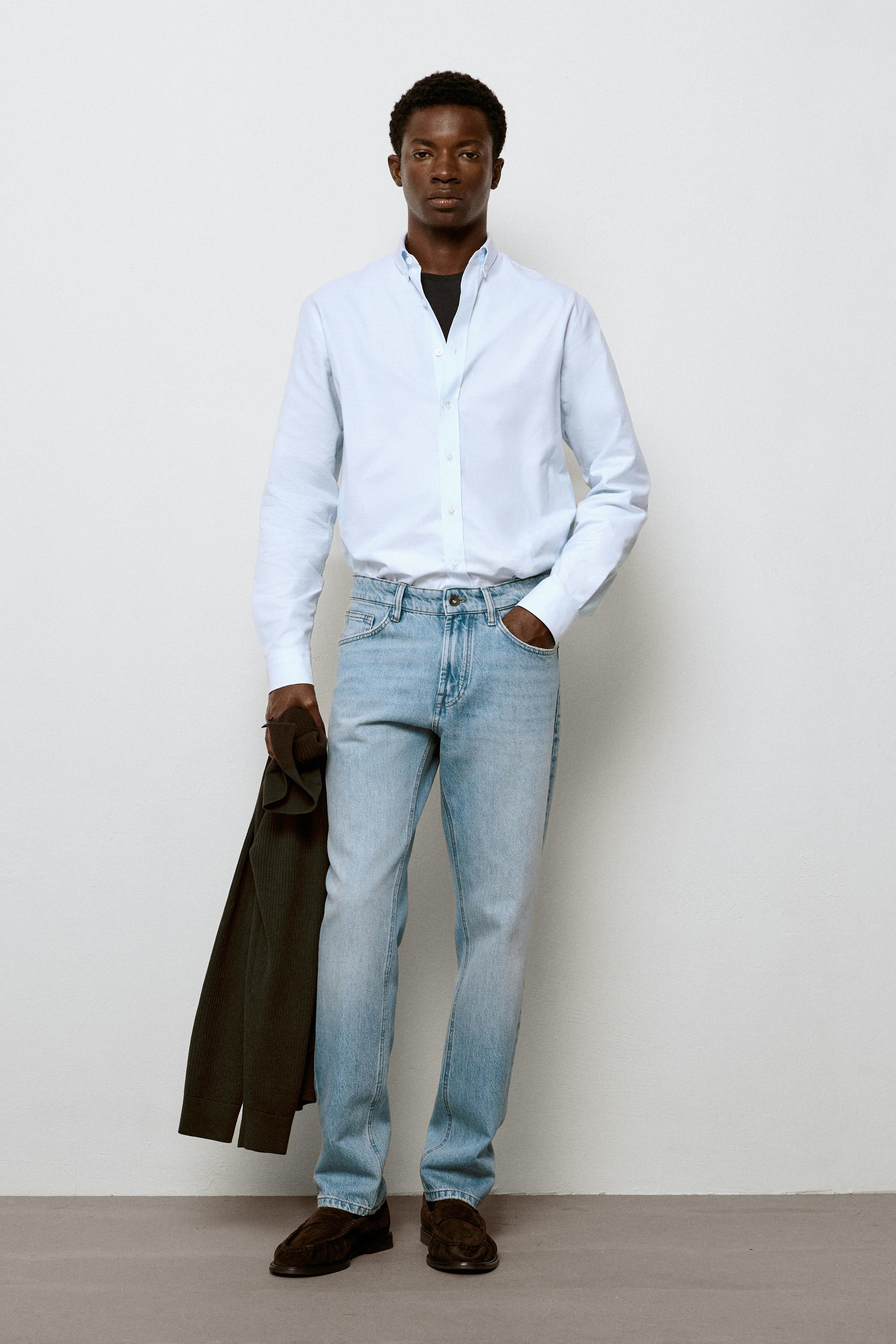 Bleach washed tapered fit jeans — Light Blue
