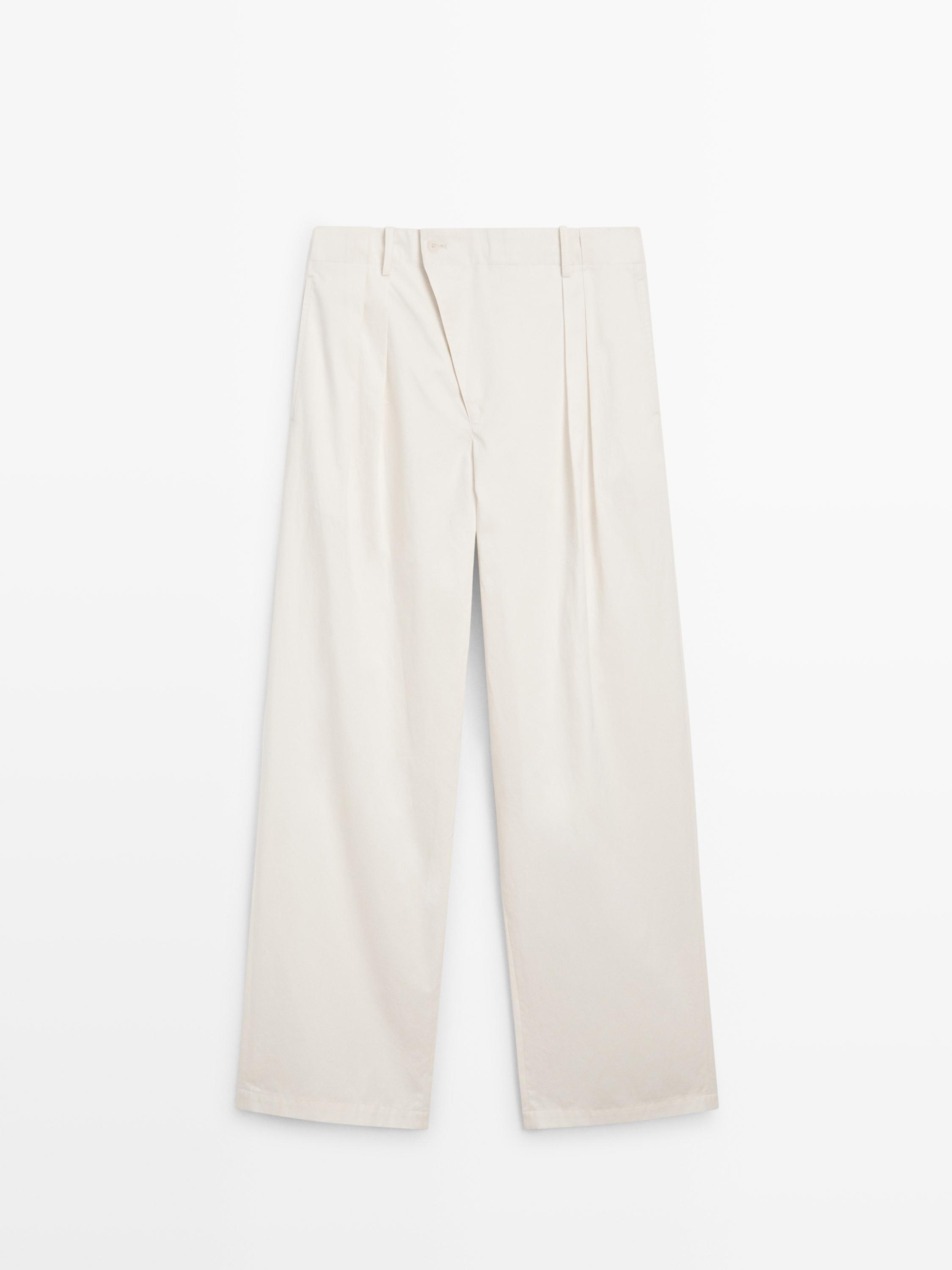 Pantalon à plis avec fermeture croisée - STUDIO