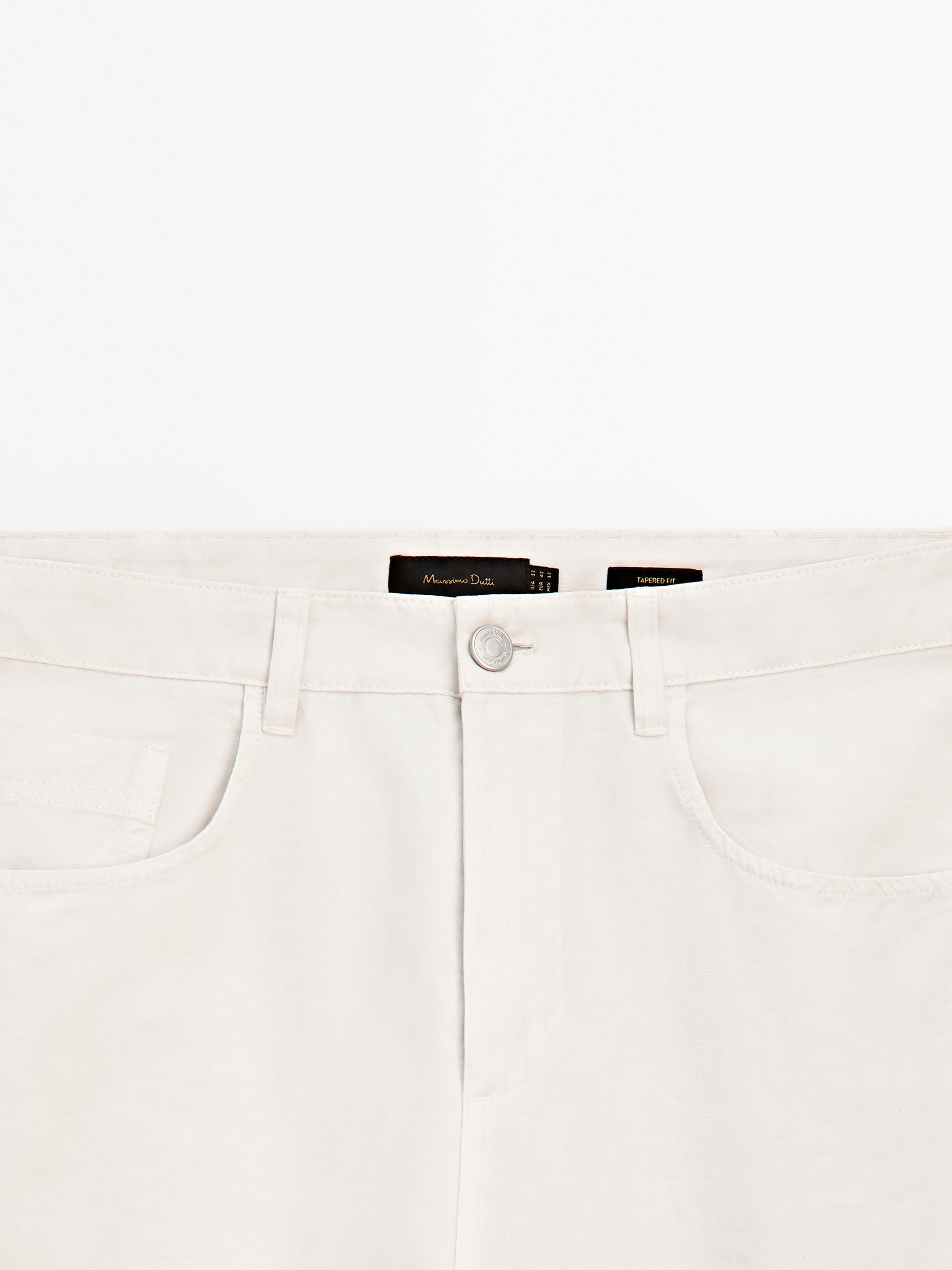 Relaxed fit cotton blend denim trousers