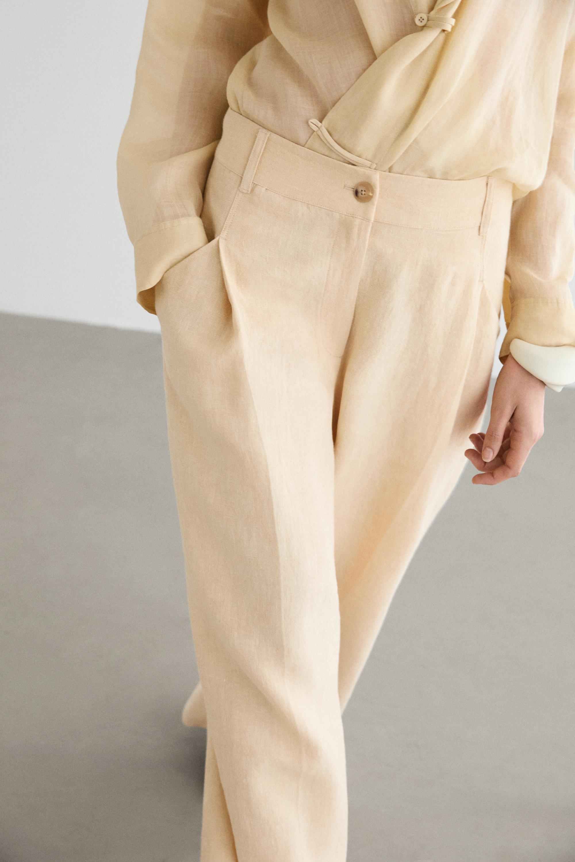 Wide-leg linen trousers with pocket detail — SAND