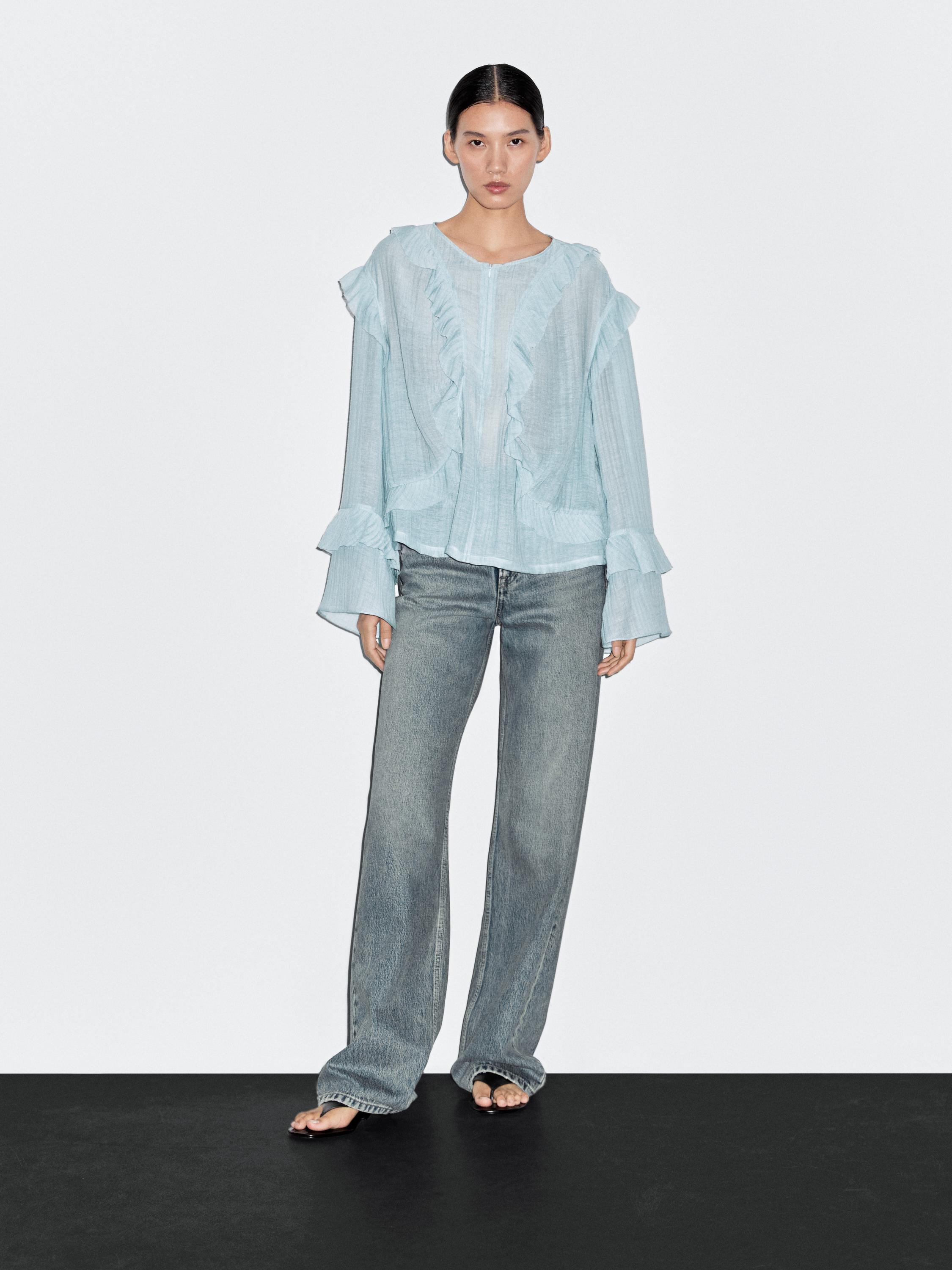 Flowing blouse with ruffles