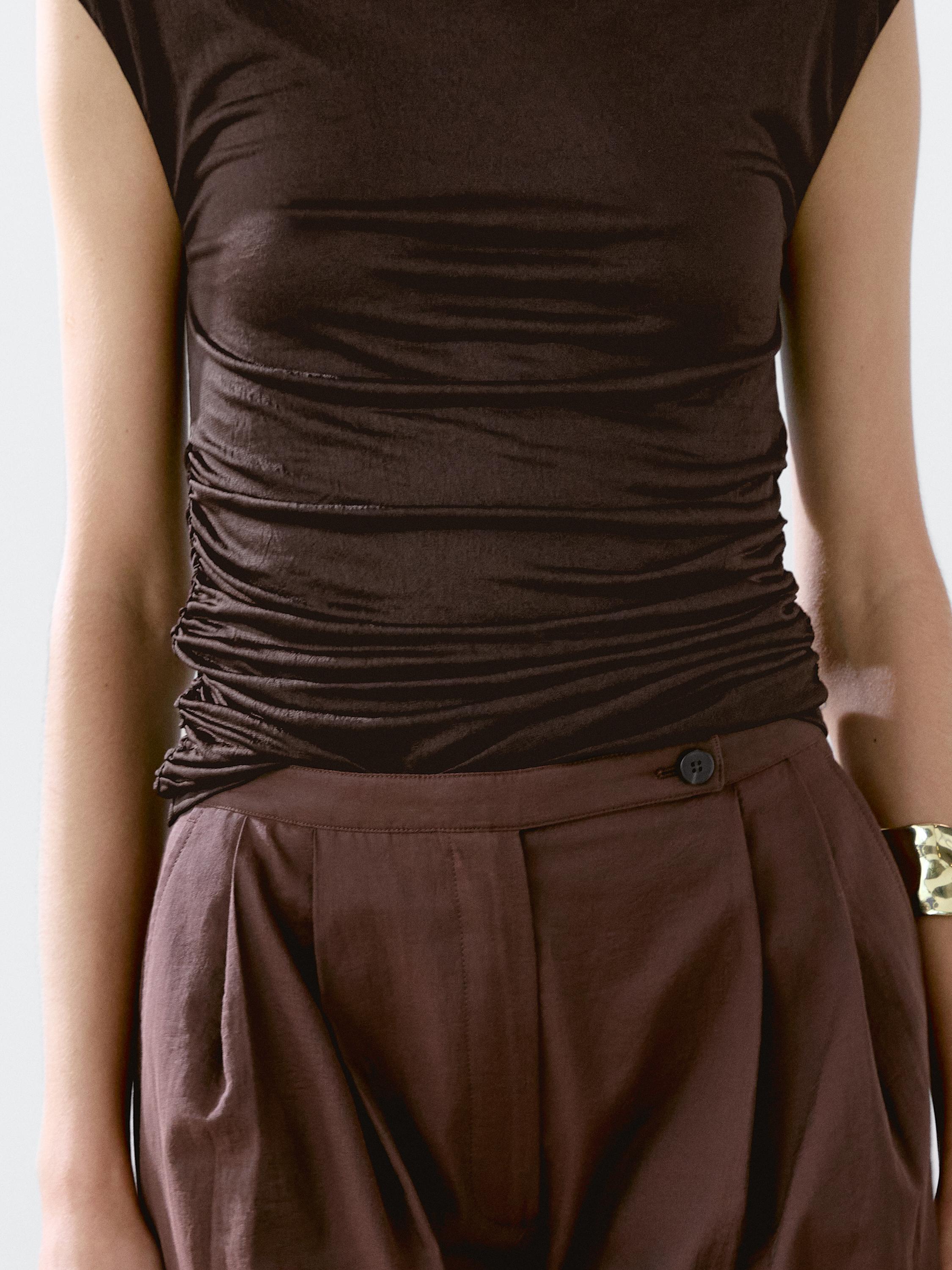 Top with draped detail