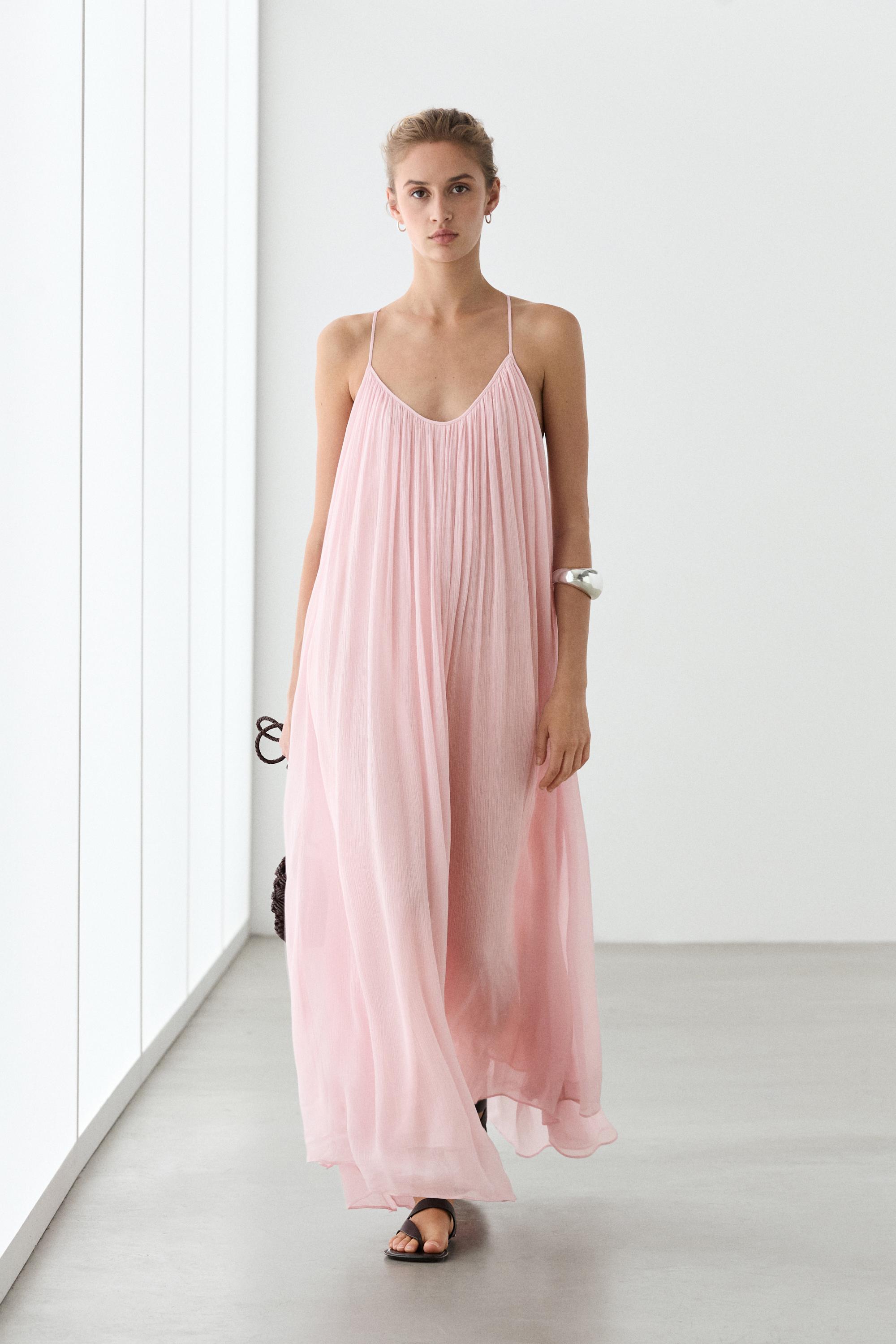 Flowing pleated spaghetti strap dress