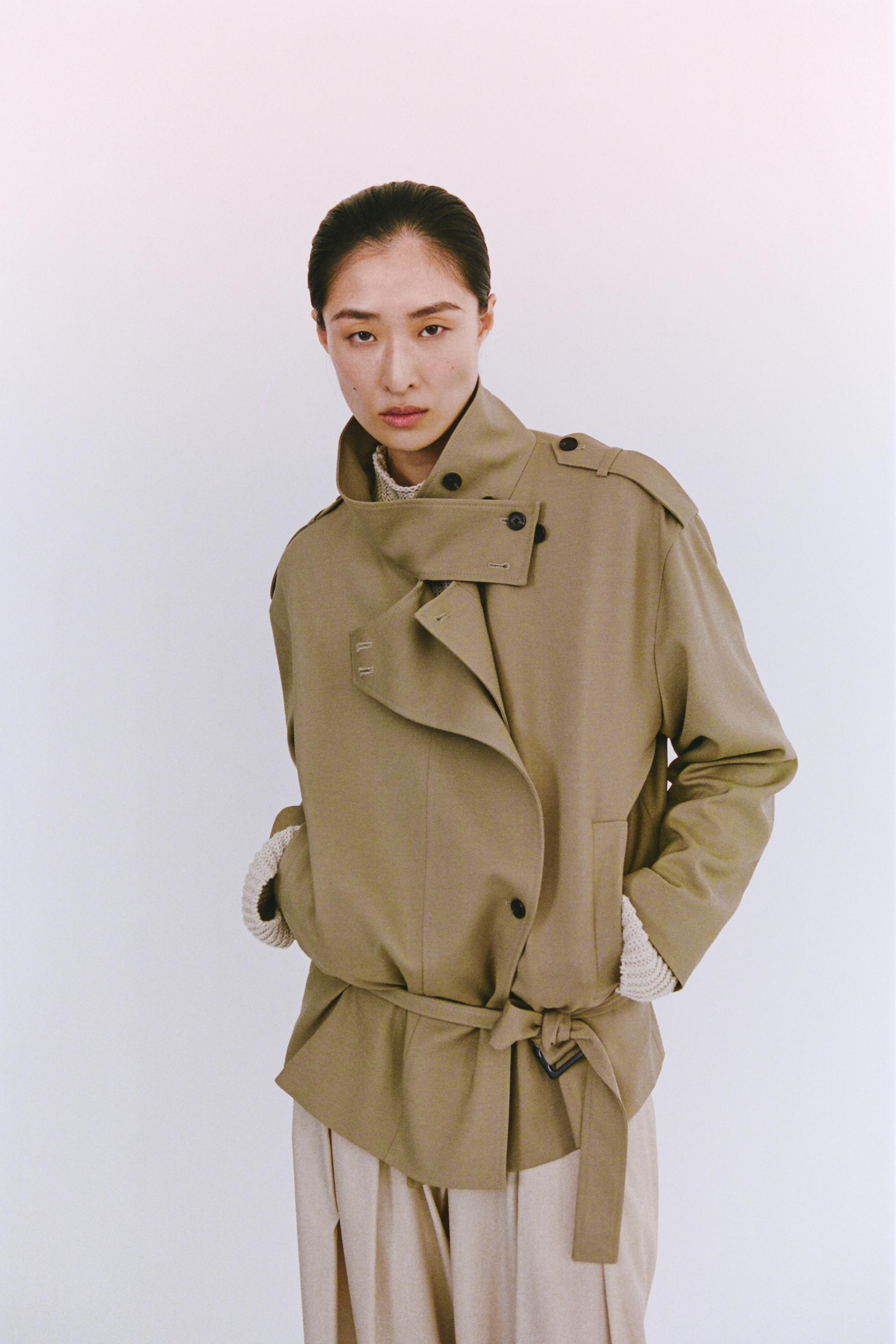 Mid-length belted trench coat
