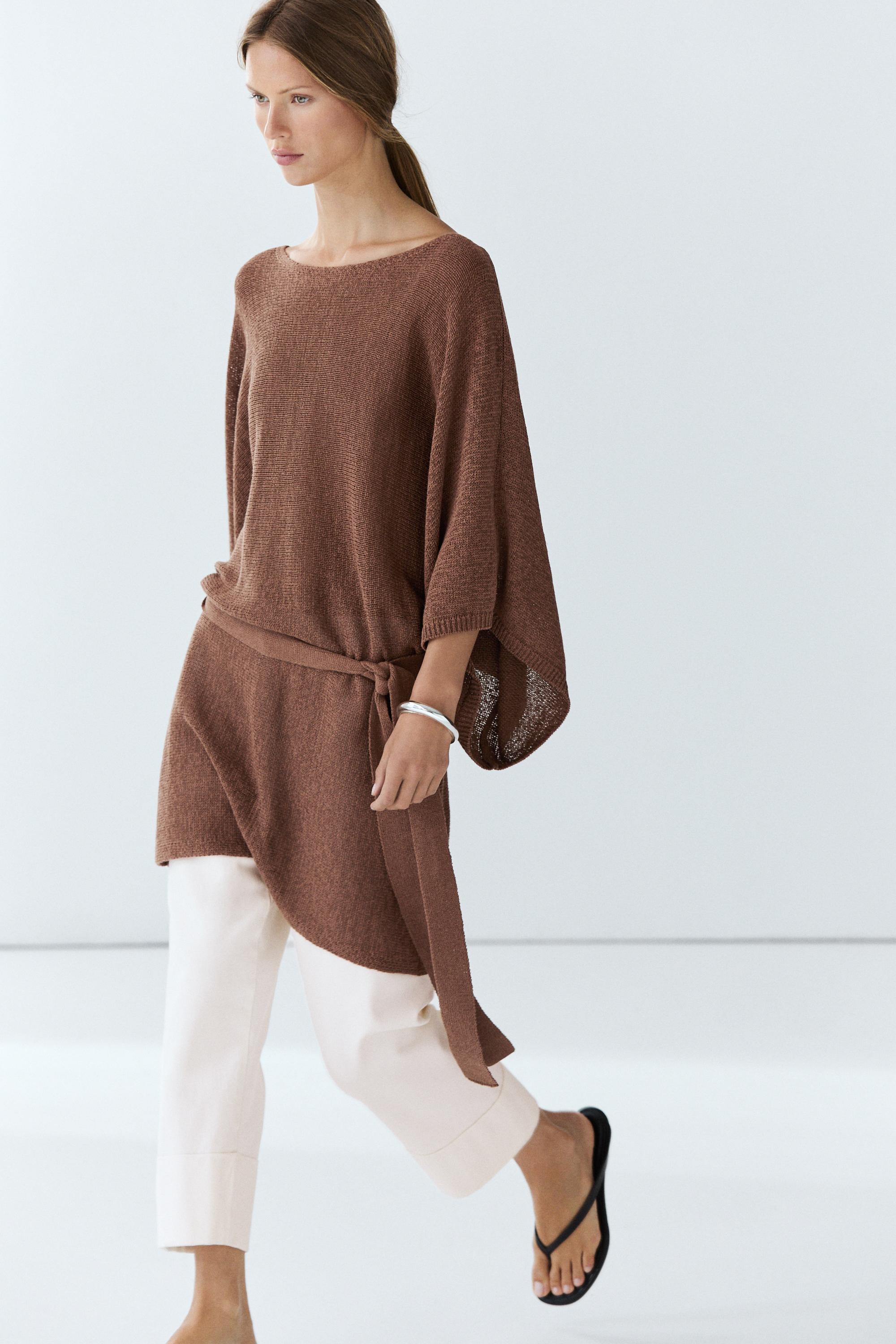 Maglia in maglia con cintura e cotone