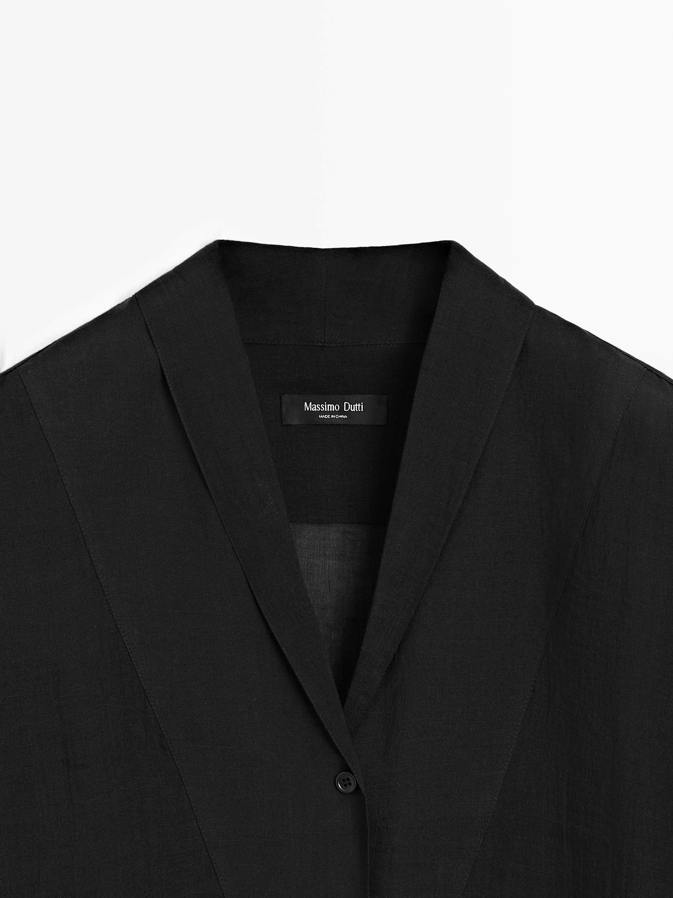 Flowing semi-sheer shirt with chest detail — BLACK