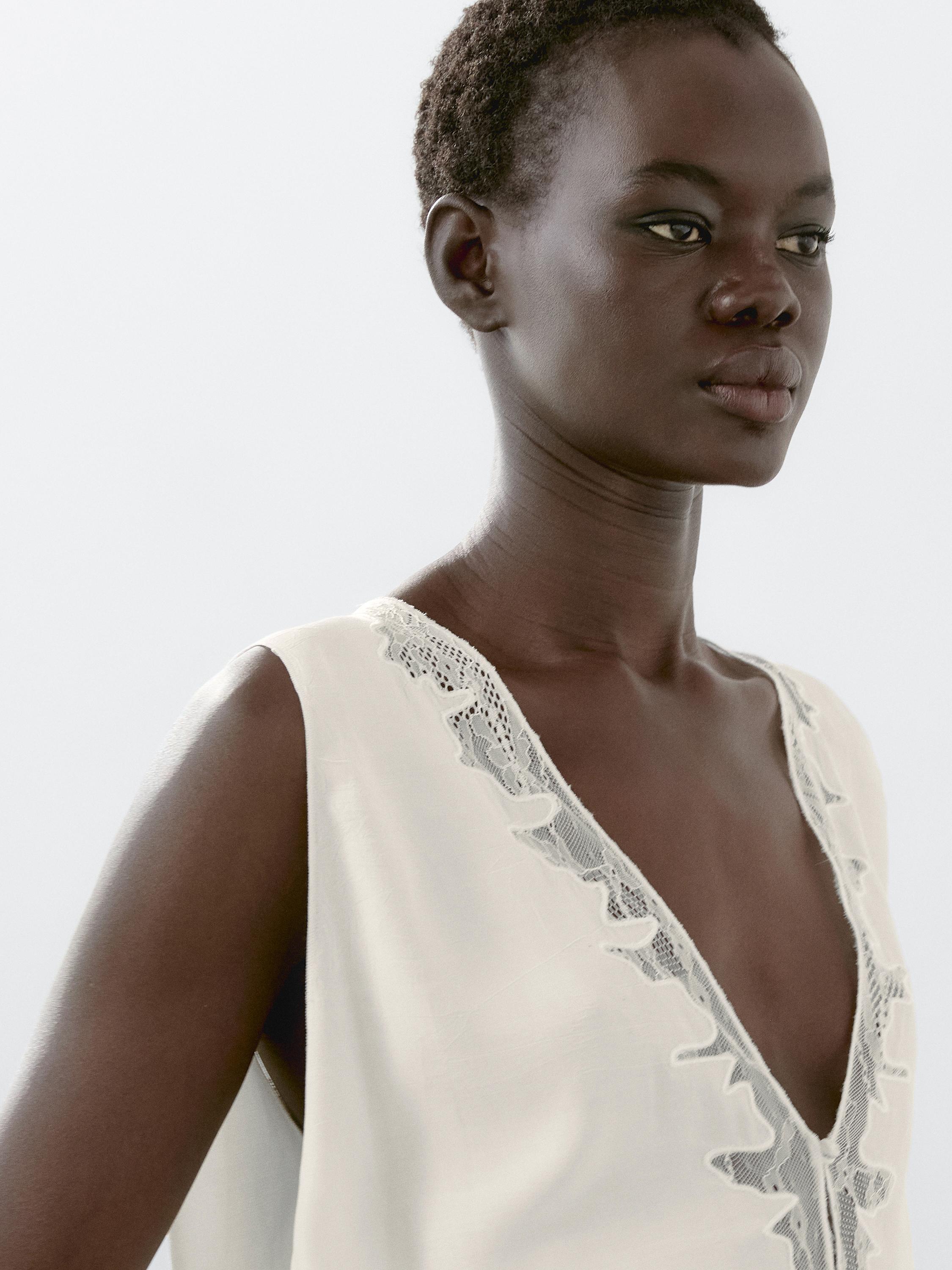 Flowing blouse with lace detail