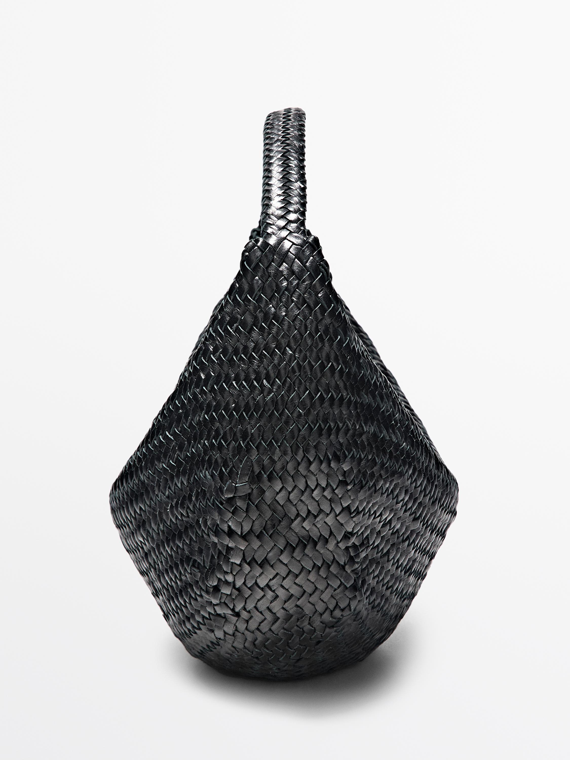 Braided leather half-moon bag — BLACK