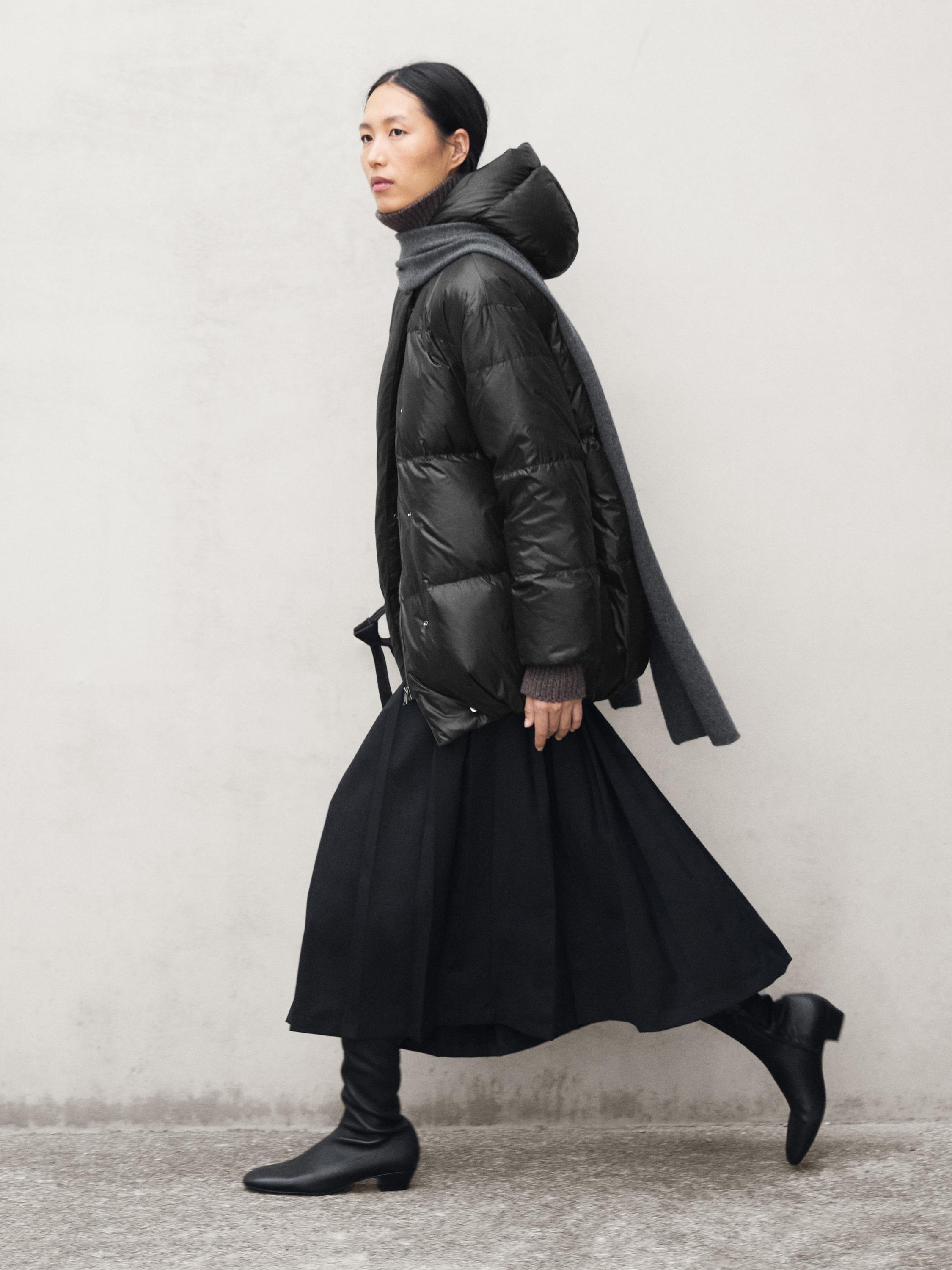 Kapuutsiga tepitud jope