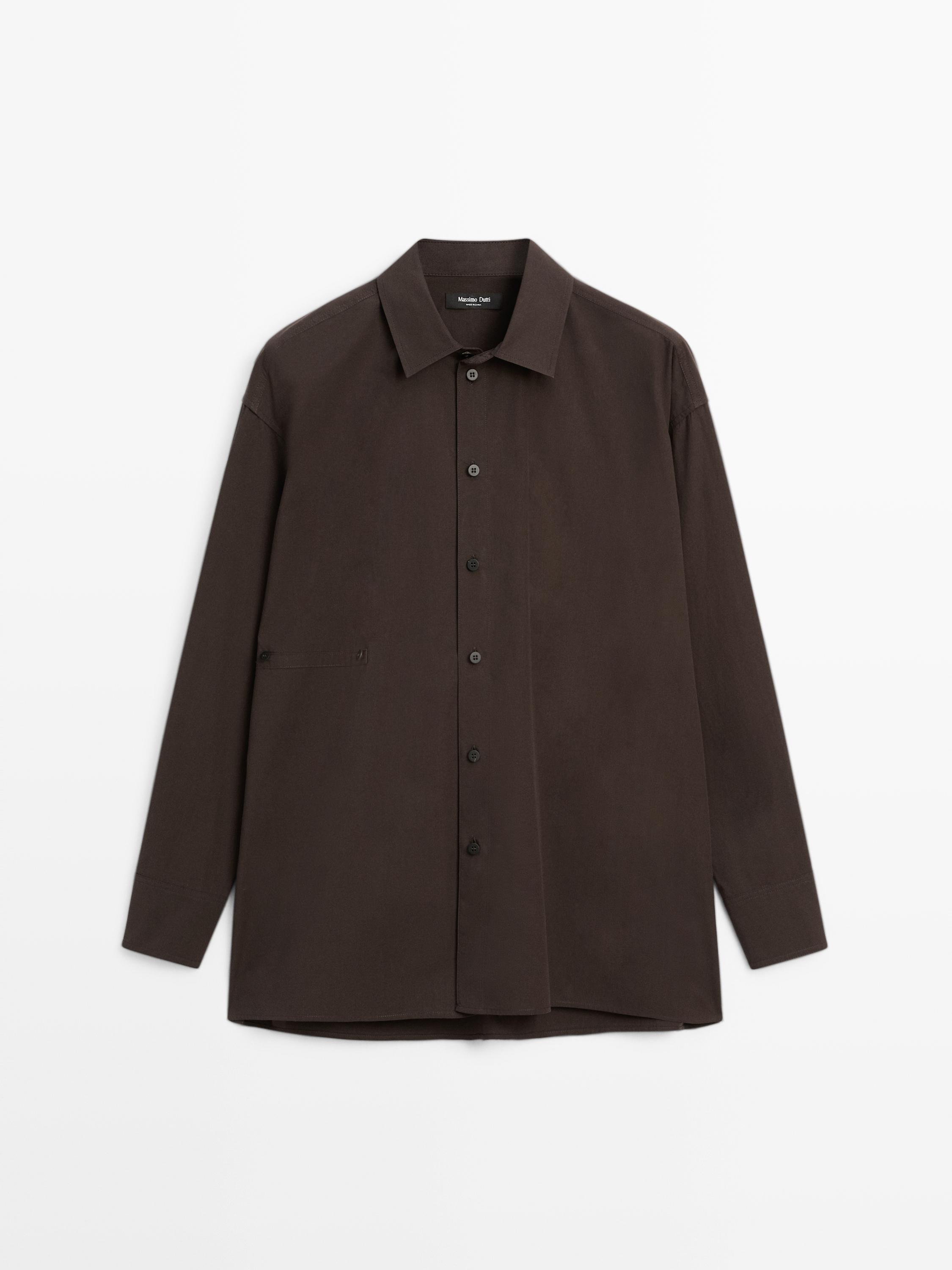 Camisa popelín botonadura asimétrica