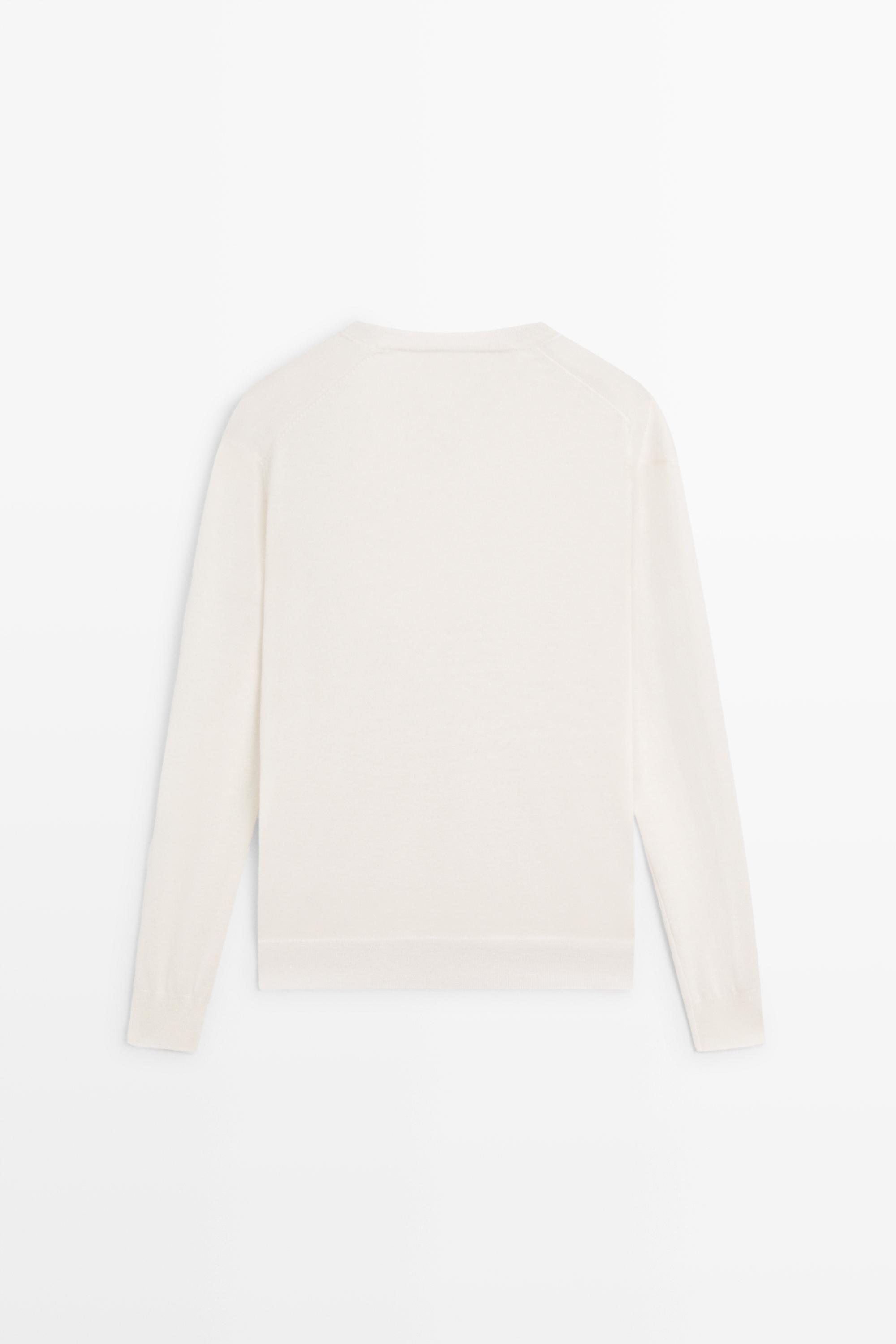 V-neck knit sweater — CREAM