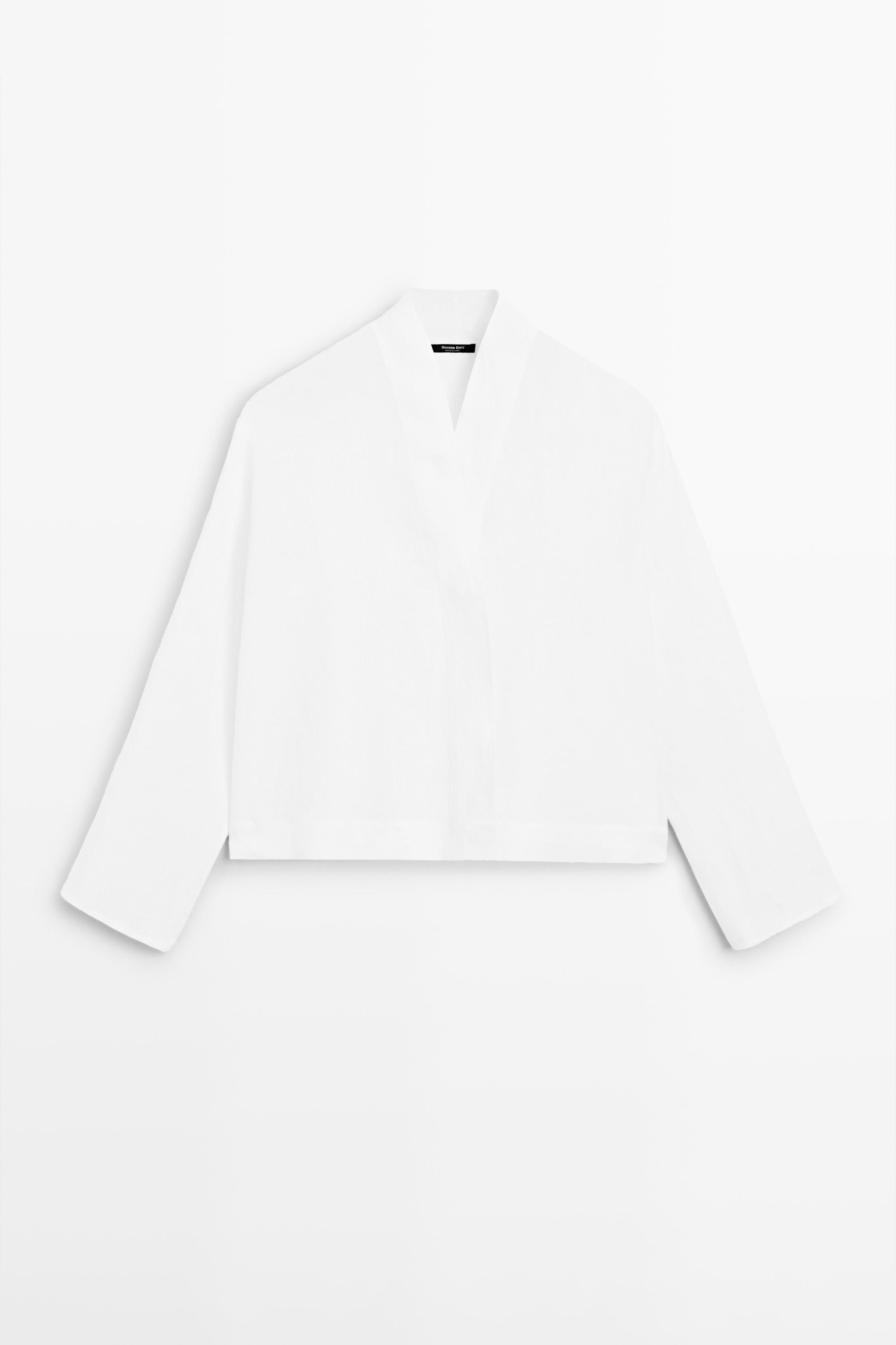 სოლისებრი ამონაჭრით სელის ბლუზა