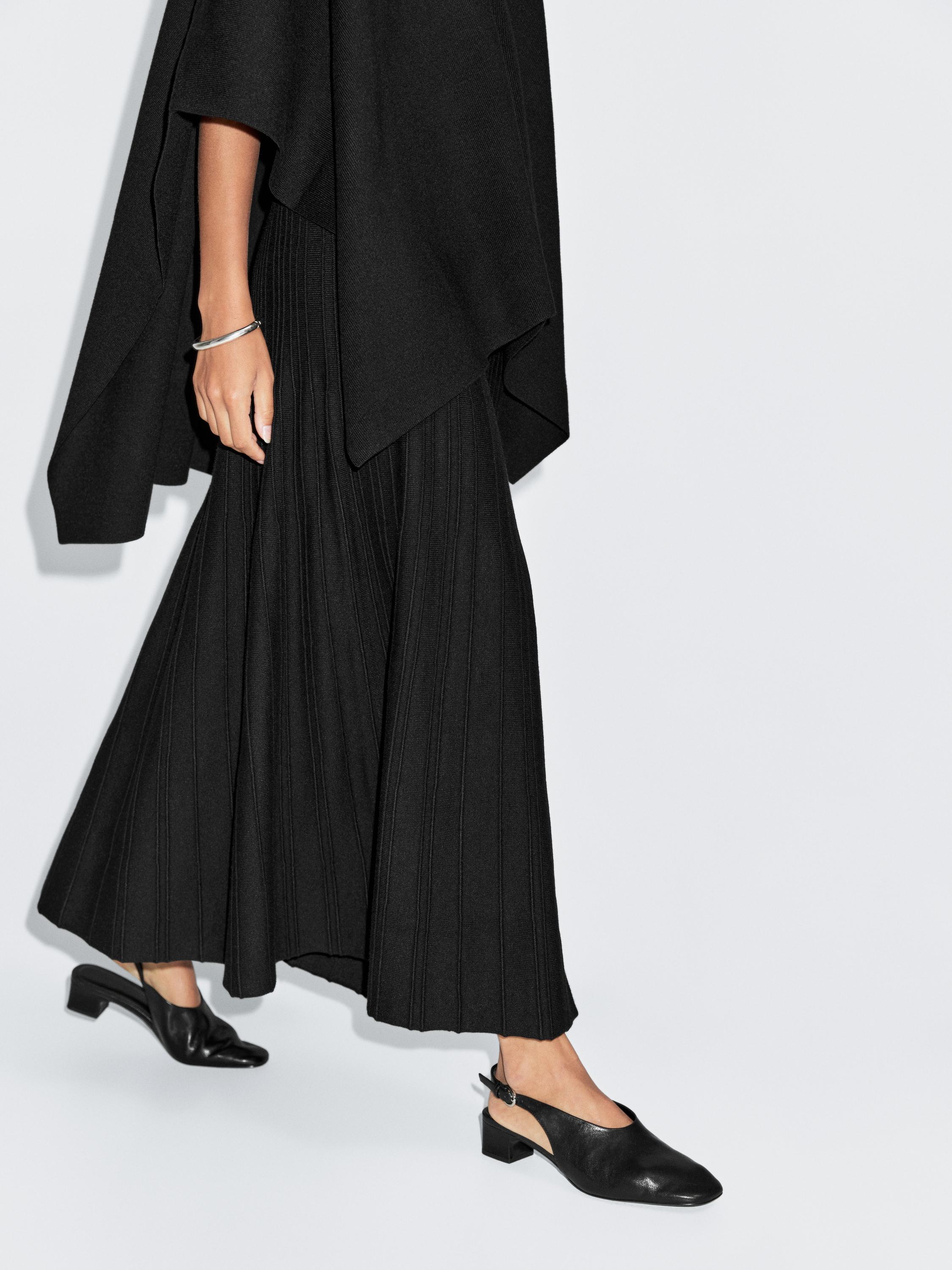 تنورة طويلة محاكة كلوش