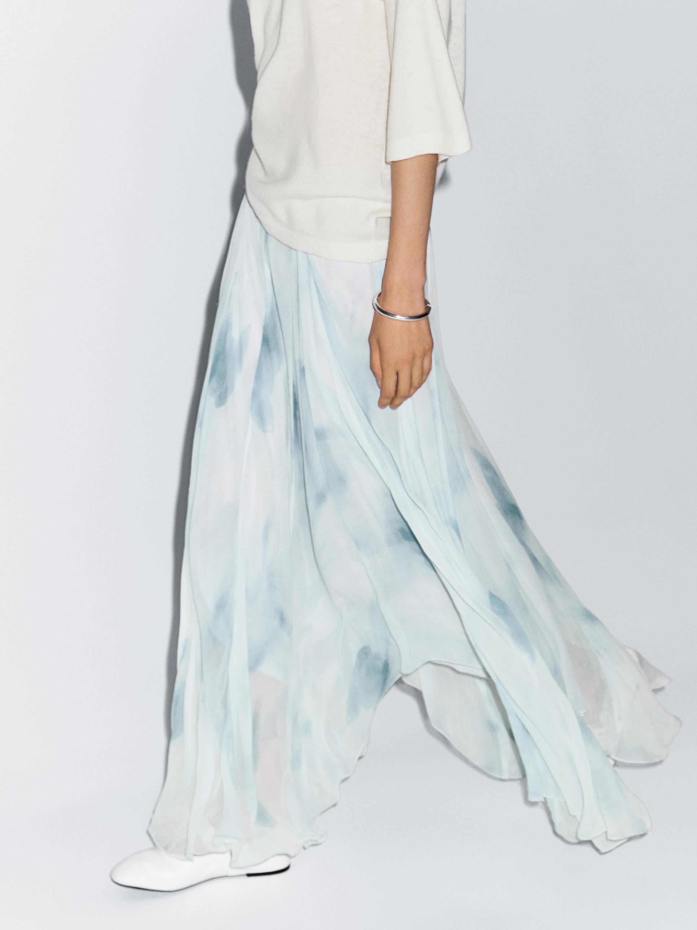 Flowing midi skirt with ruffles