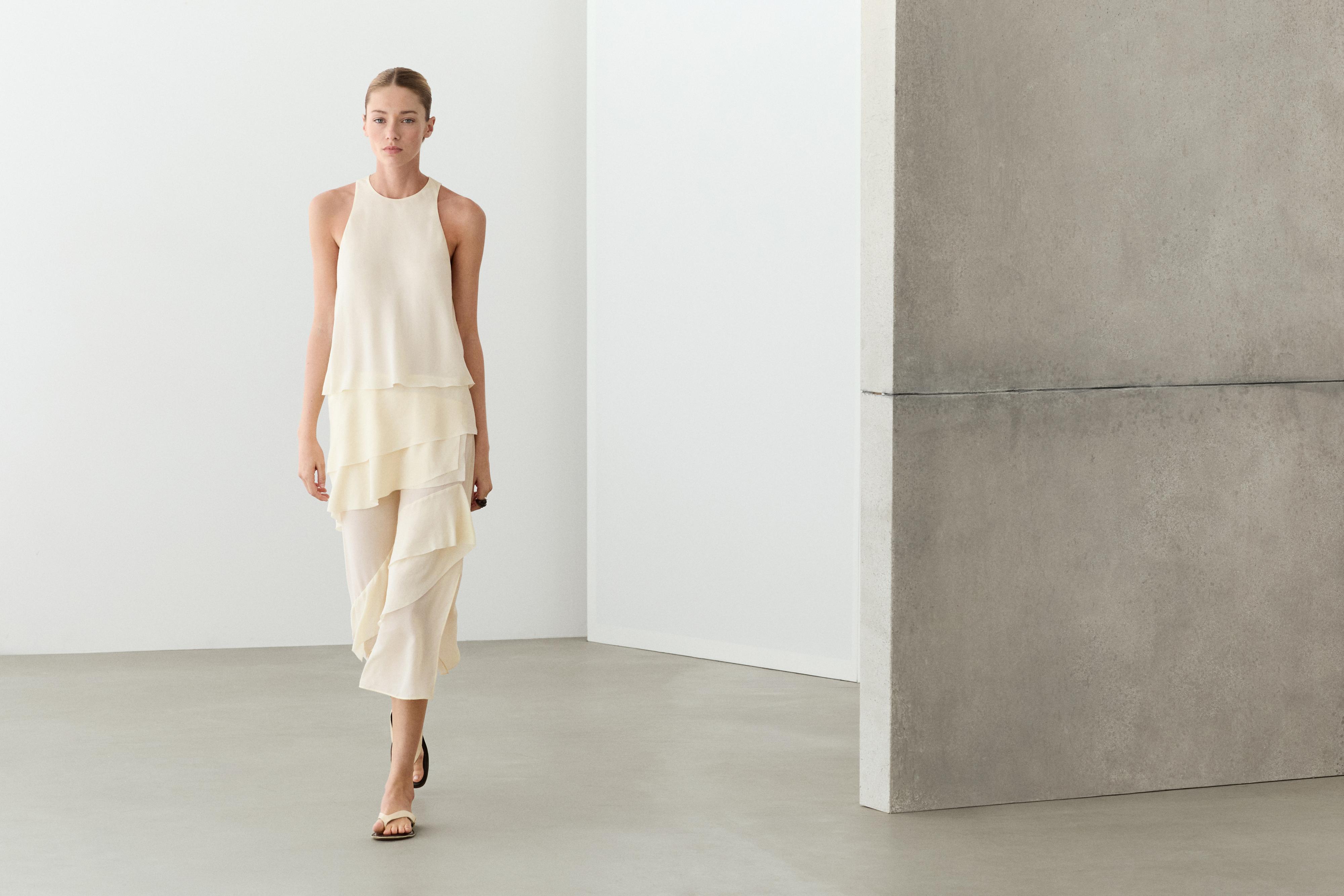Flowing midi dress with ruffles — CREAM