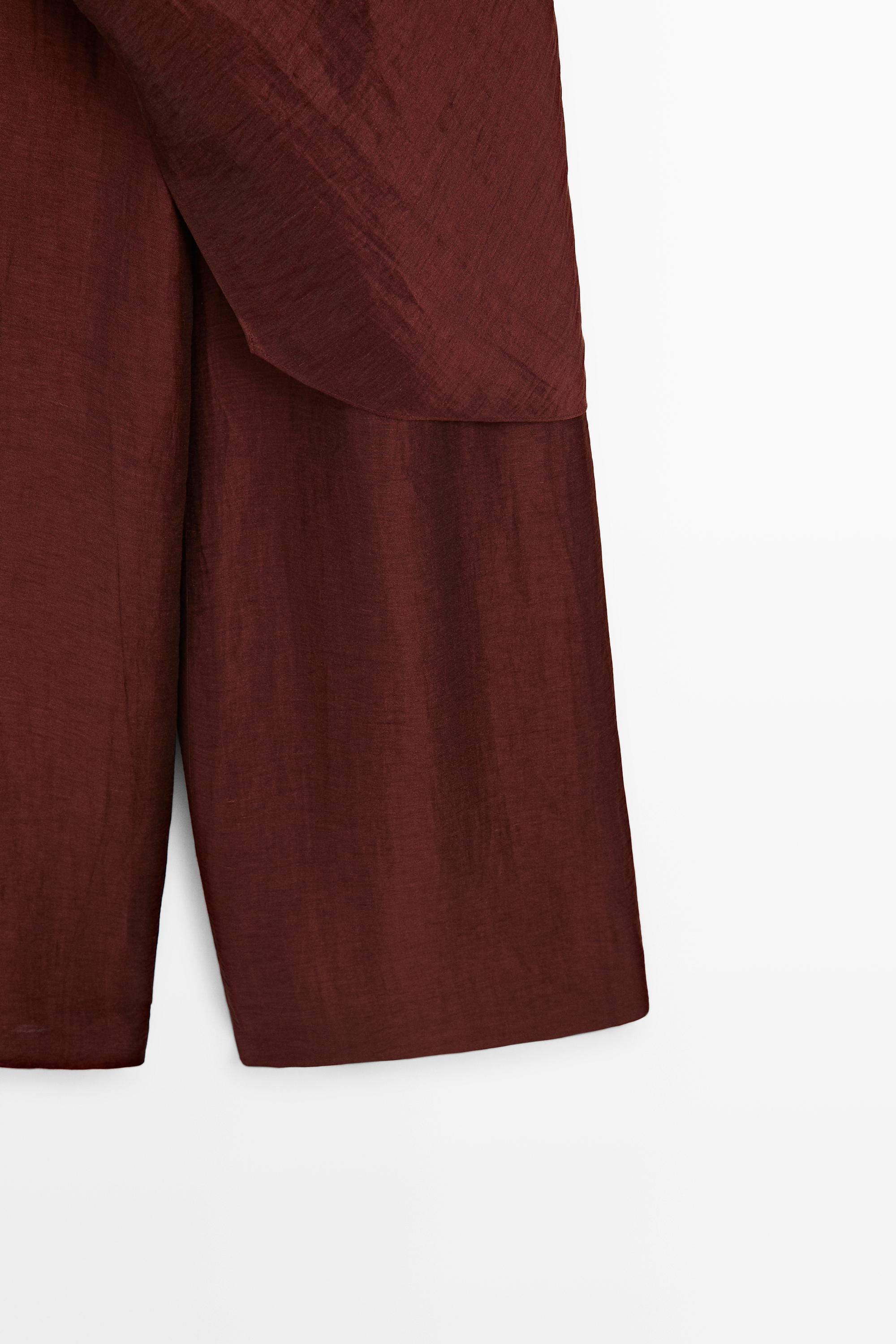 Flowing draped halter neck jumpsuit — BURGUNDY