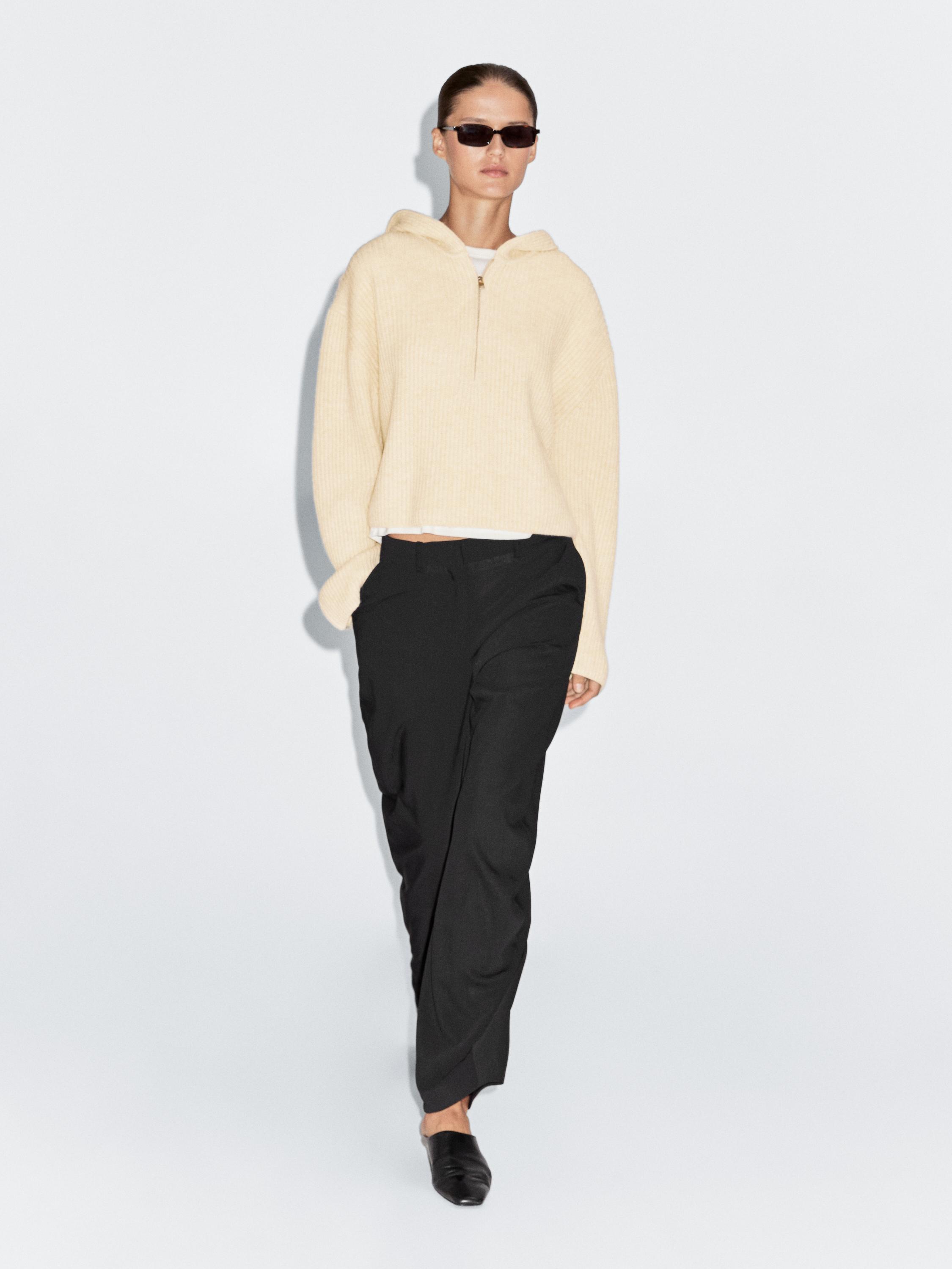 Wool blend sweater with hood detail