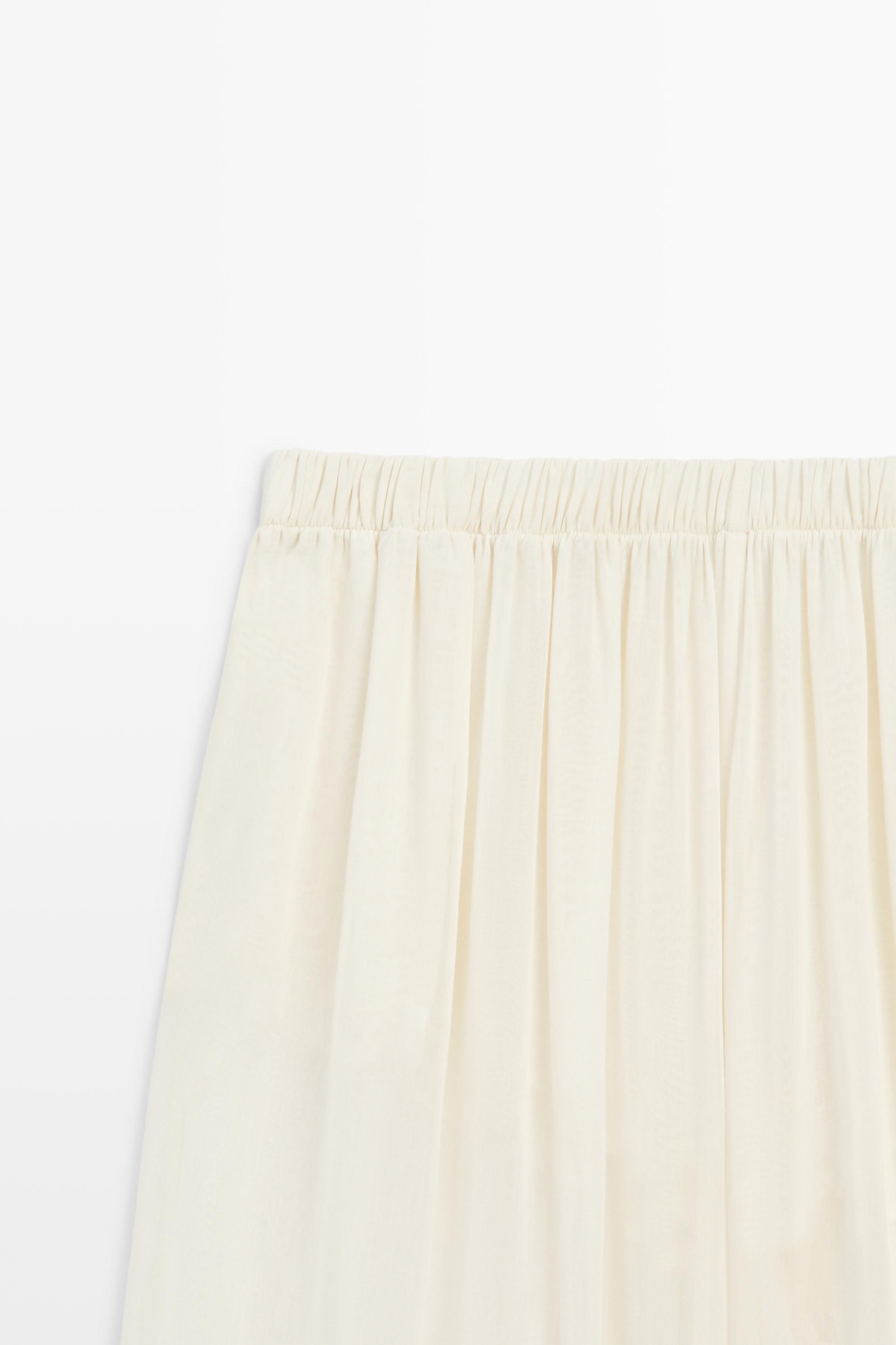 Semi-sheer flowing wide-leg pants — Off white
