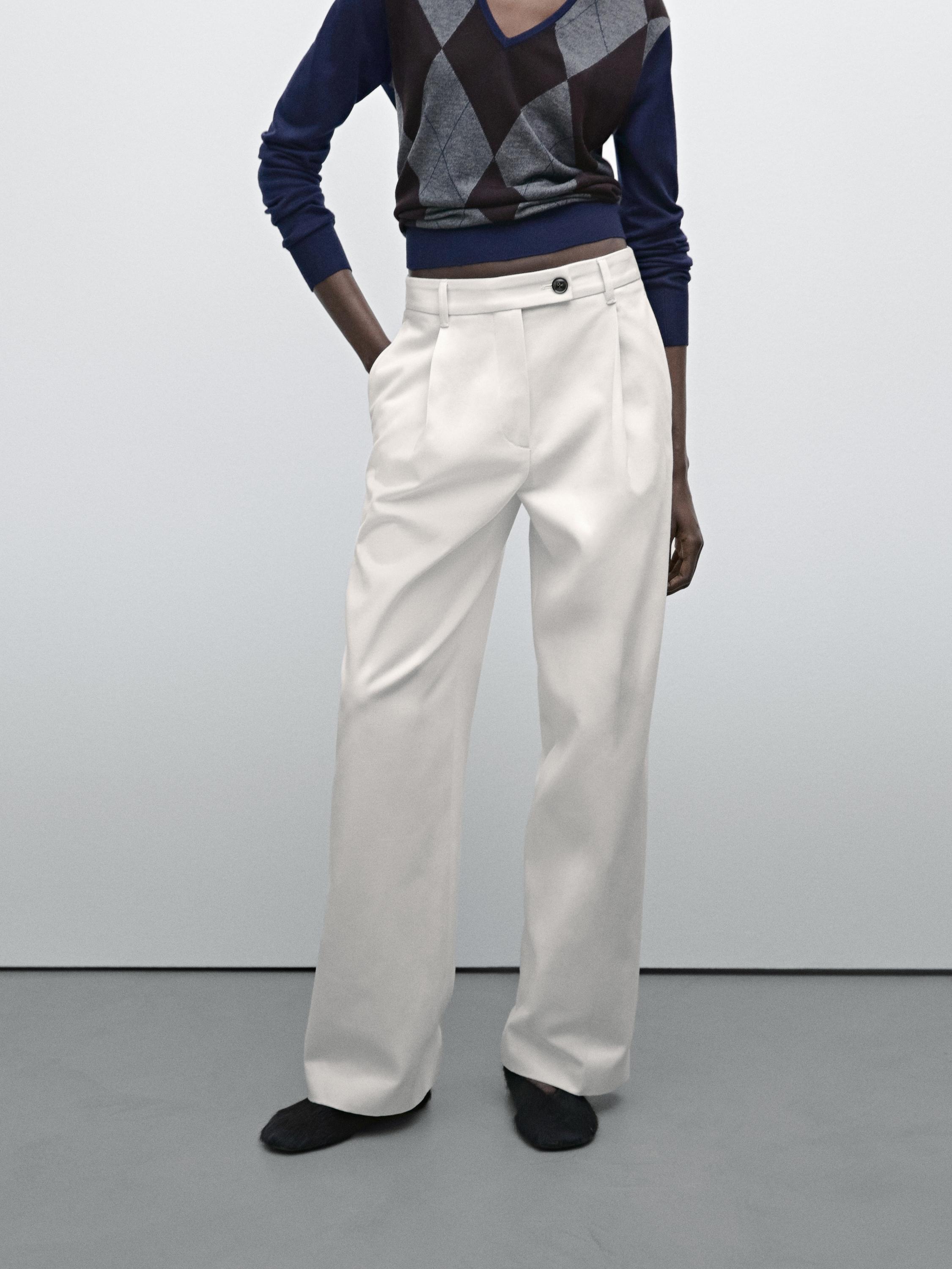 Wide-leg pleated cotton blend trousers