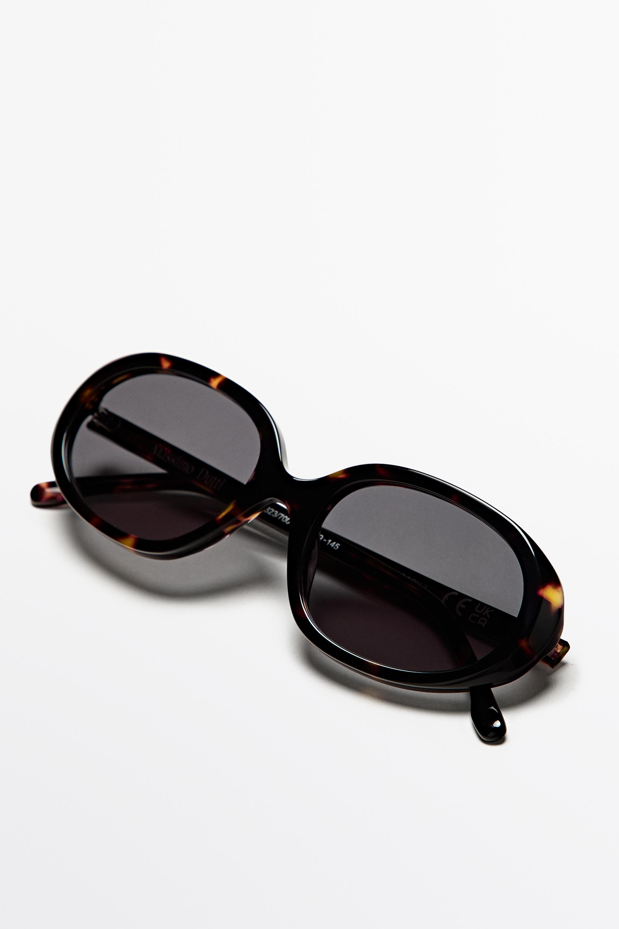 Oval tortoiseshell-effect sunglasses — BROWN