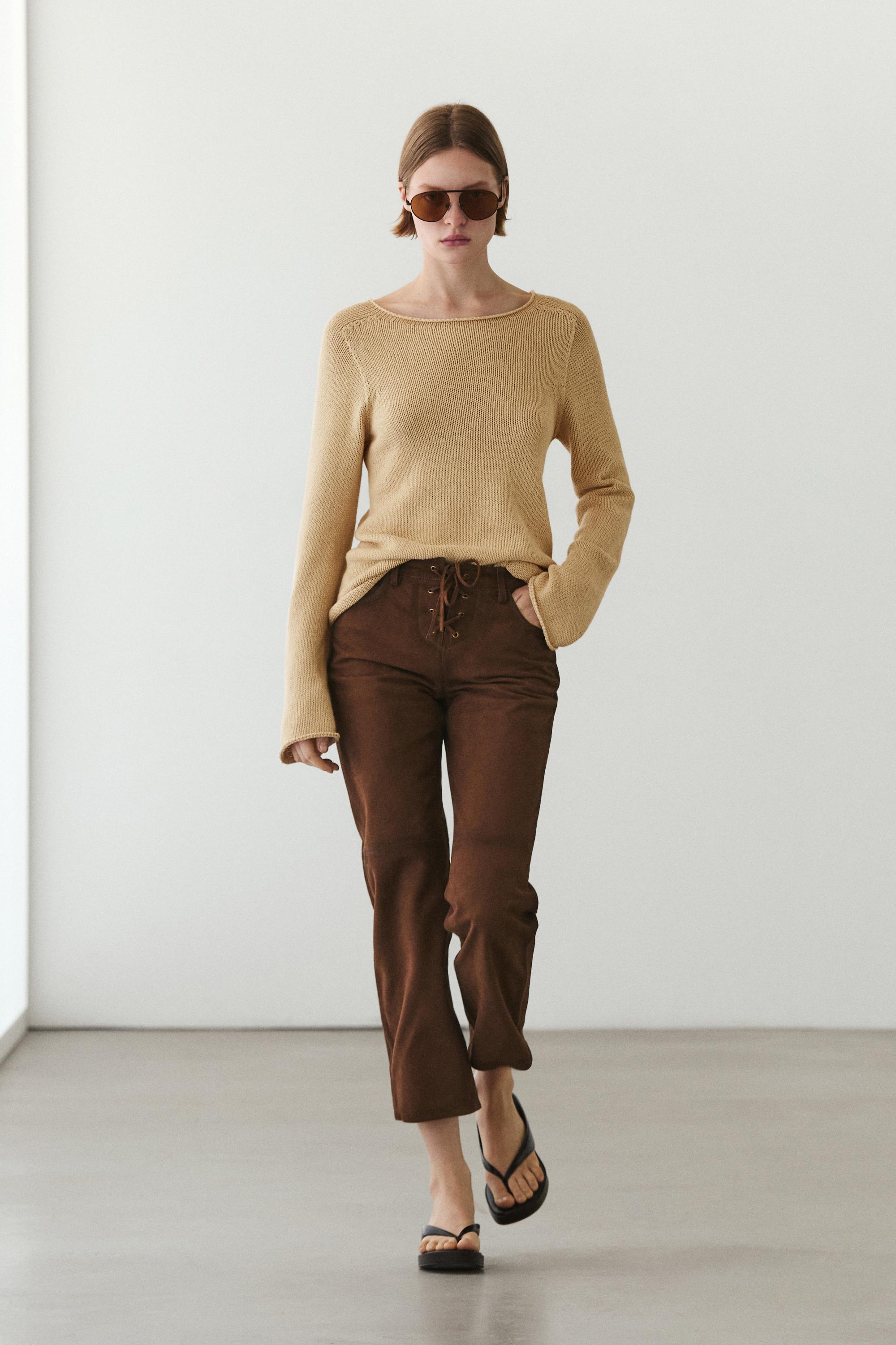 Skrajšane hlače z vrvico in detajli iz semiš usnja