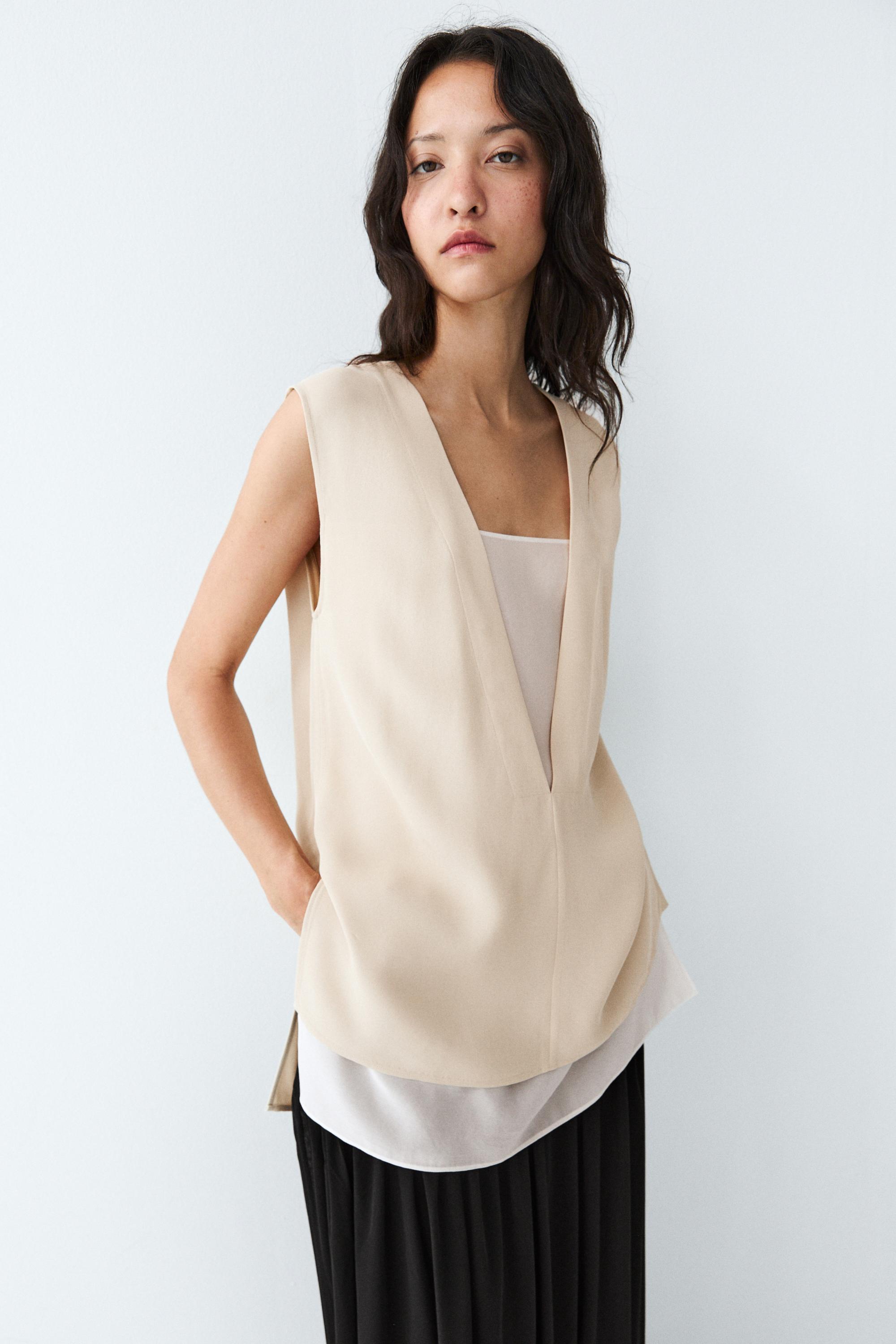 Flowing double-layer top with contrast detail — CREAM