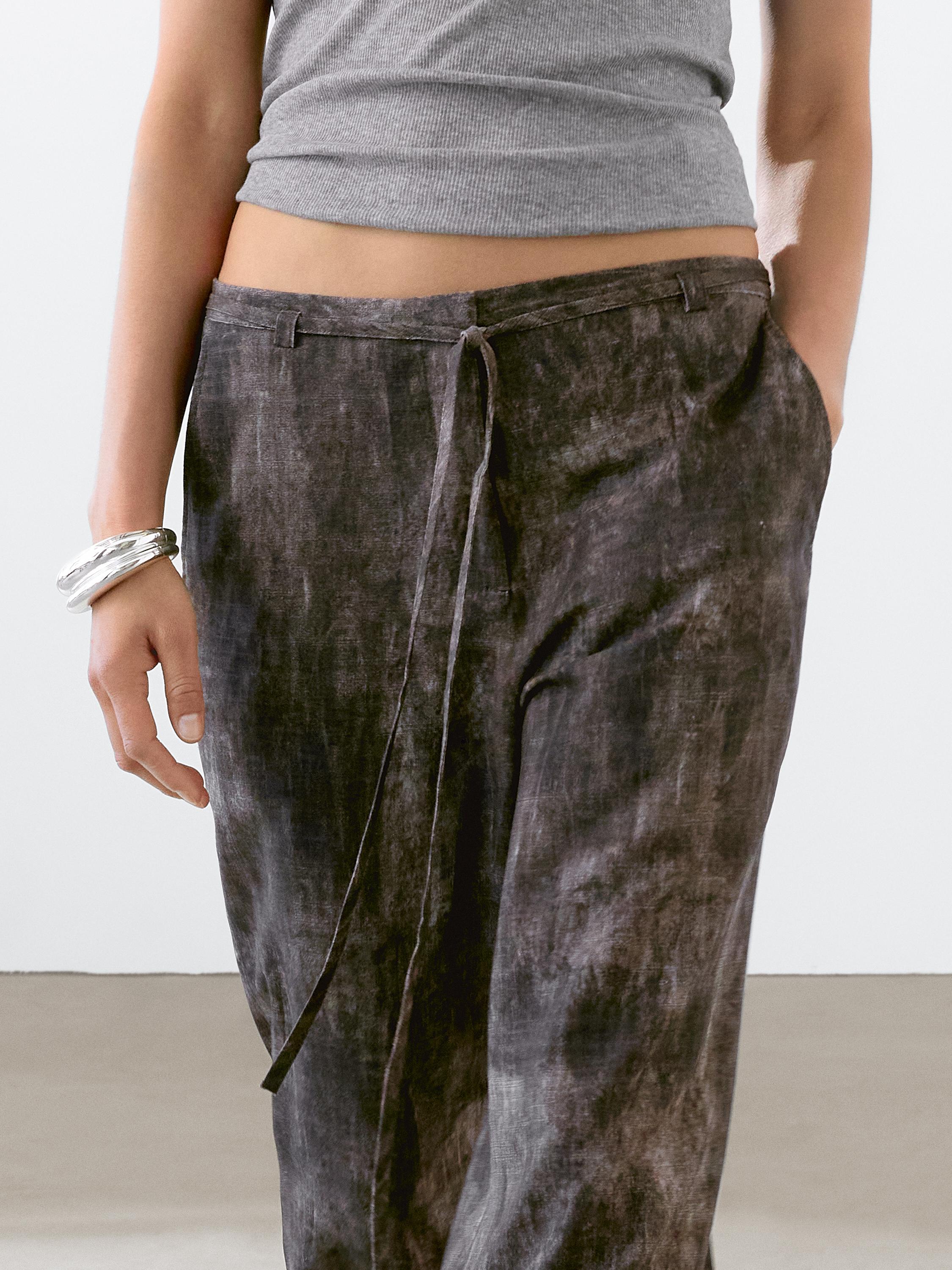 Pantalon flare effet usé