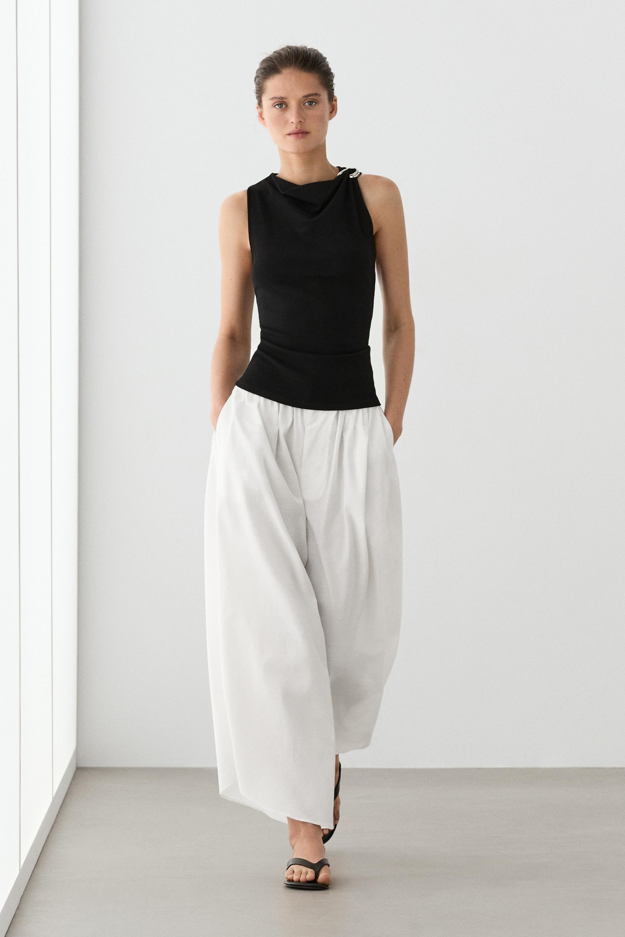 Draped neckline top with brooch detail