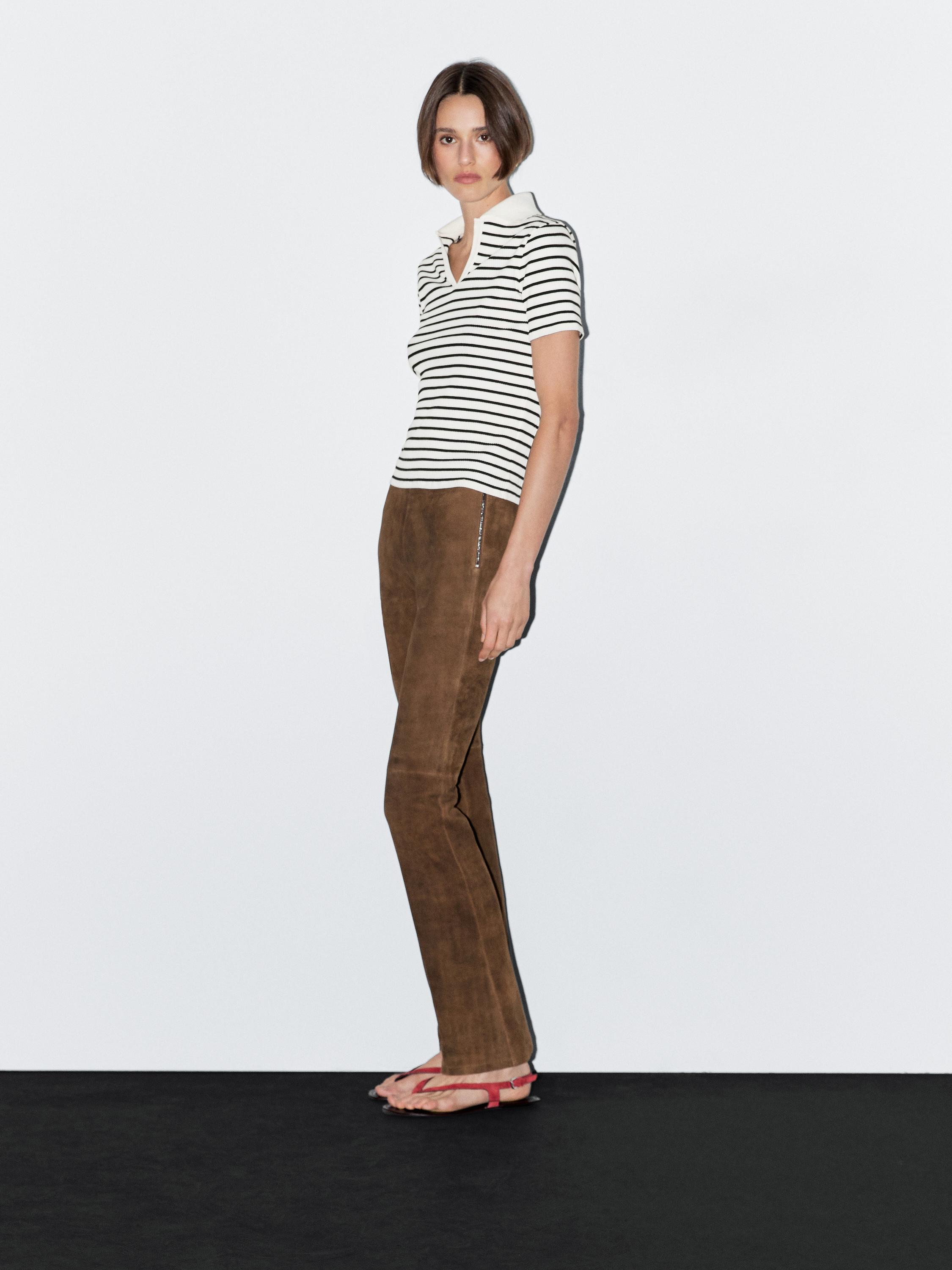 T-shirt polo às riscas em mistura de algodão