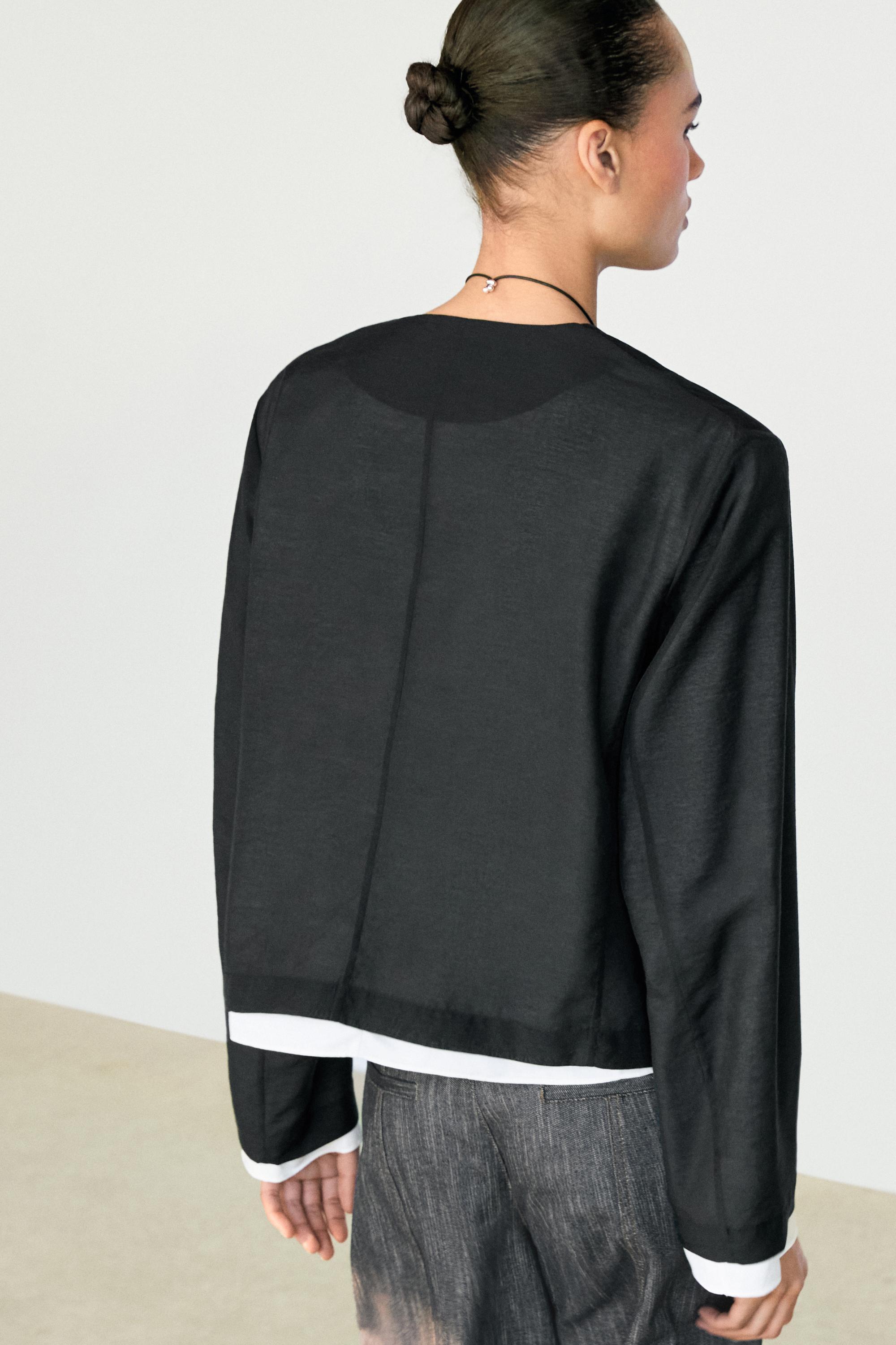 Contrast double jacket for a complete look — BLACK