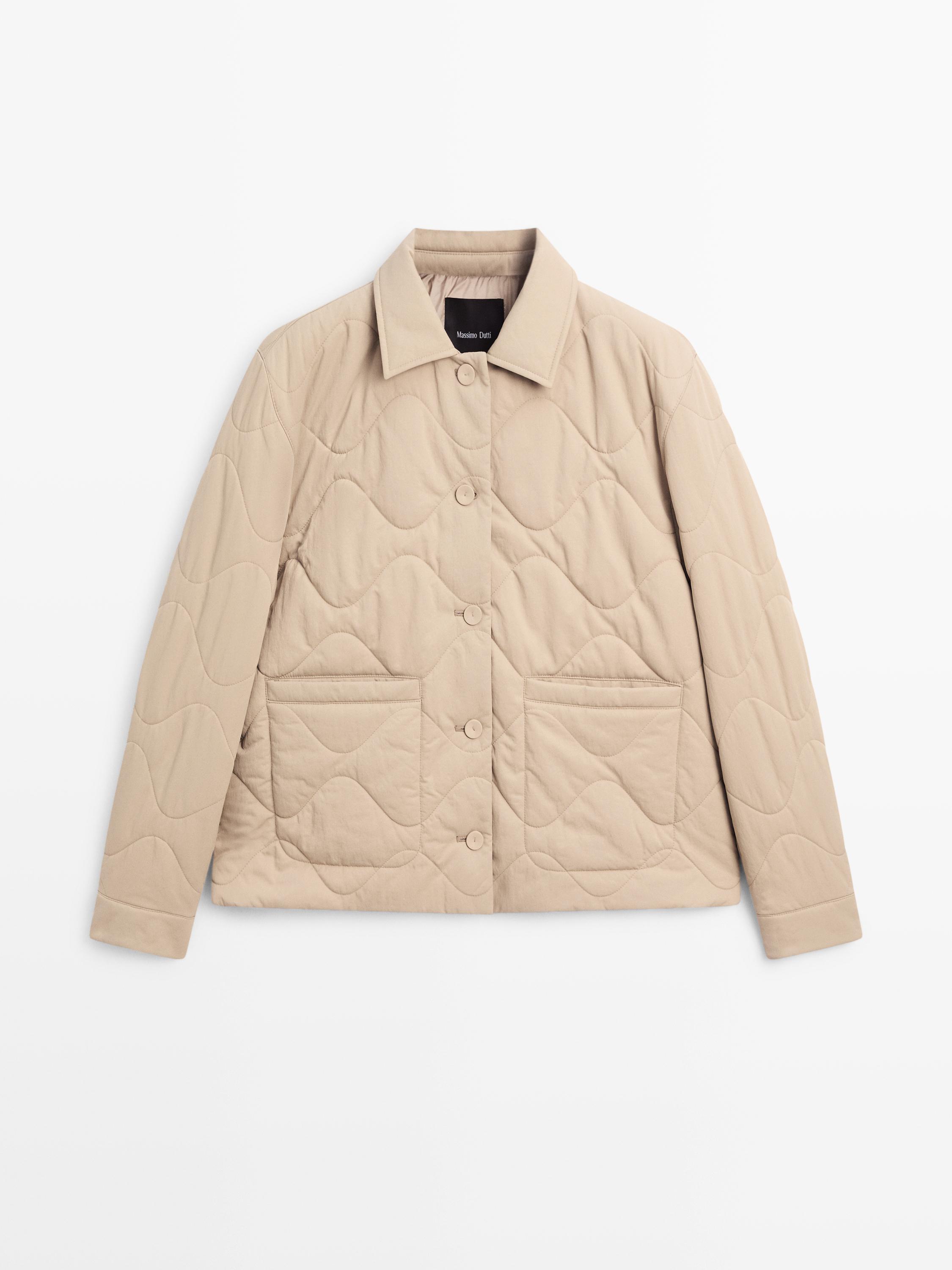 Puffer jacket with seam details