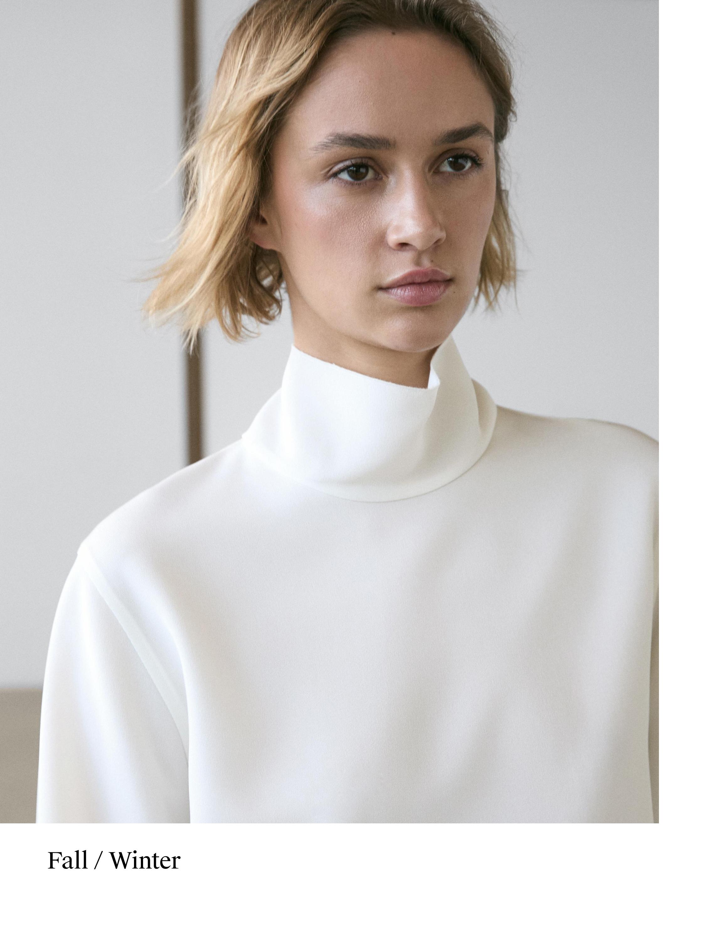 High neck blouse with hem detail — WHITE