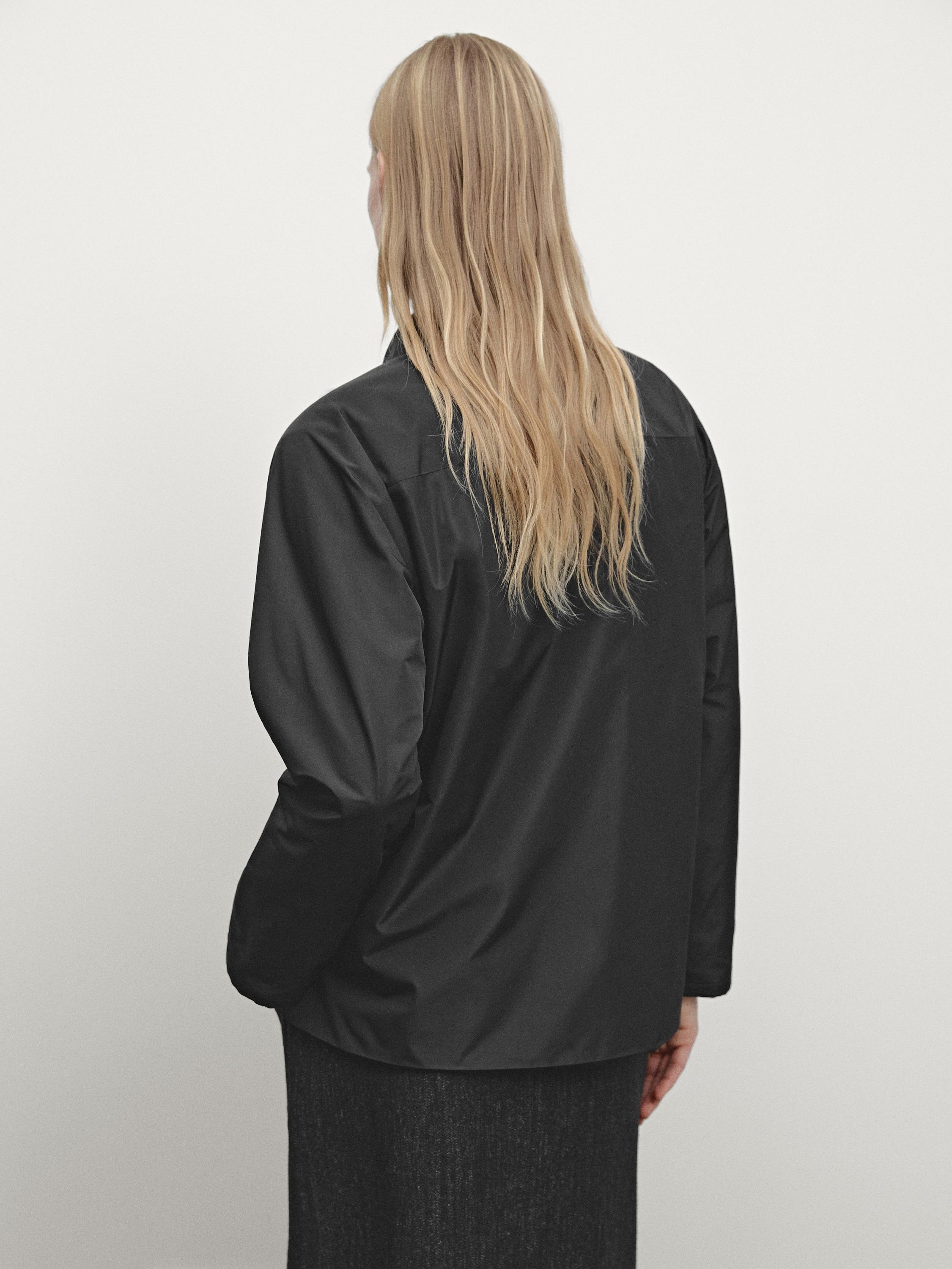Veste double en tissu technique