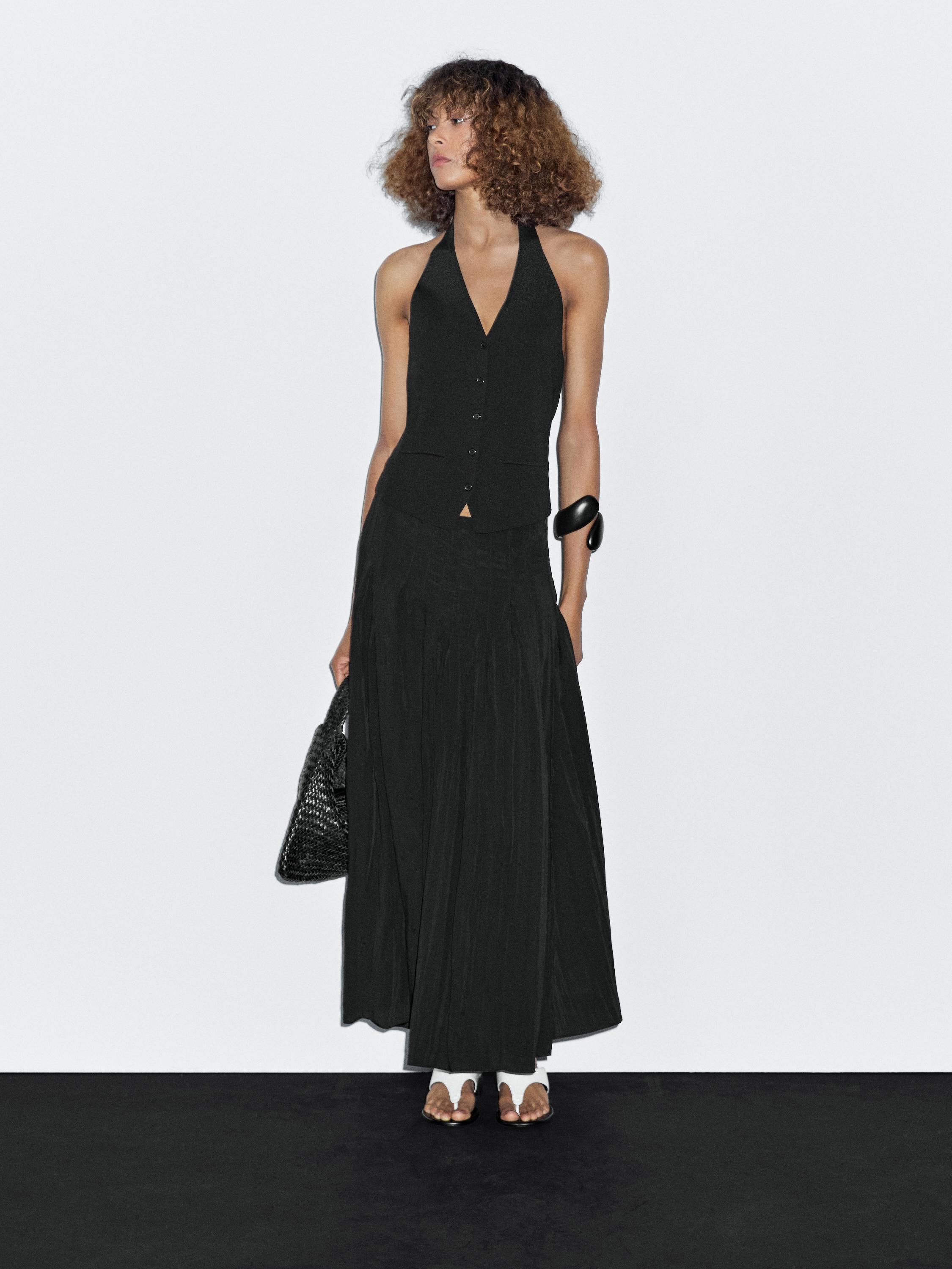 Megzta liemenė su „halter“ iškirpte