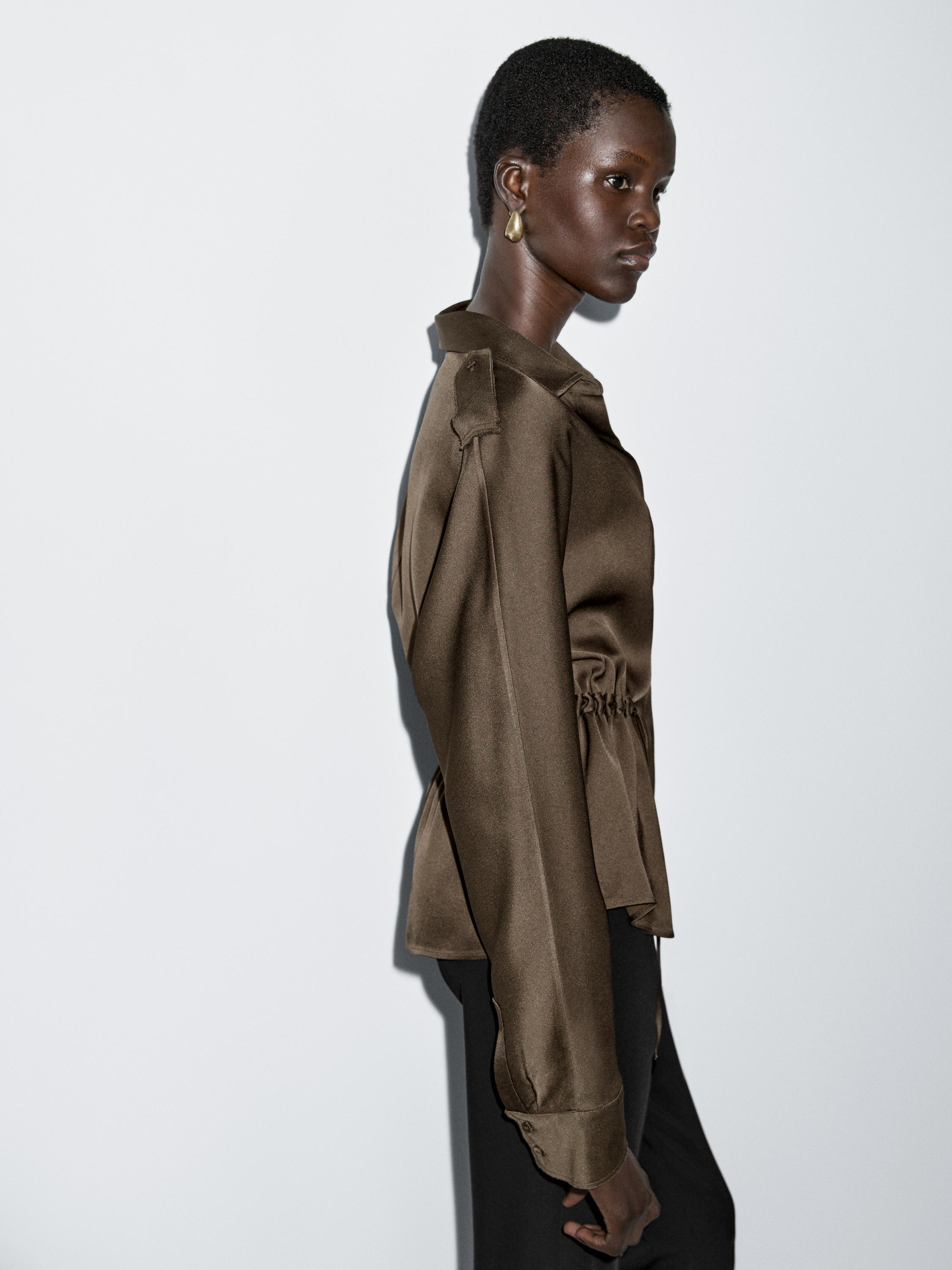 Flowing shirt with waist detail