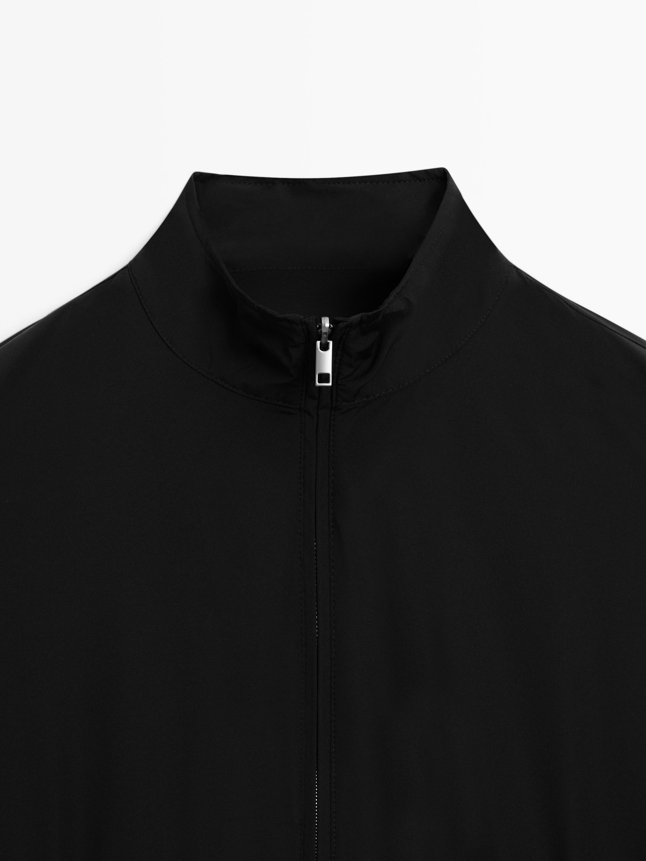 Reversible high neck jacket — BLACK