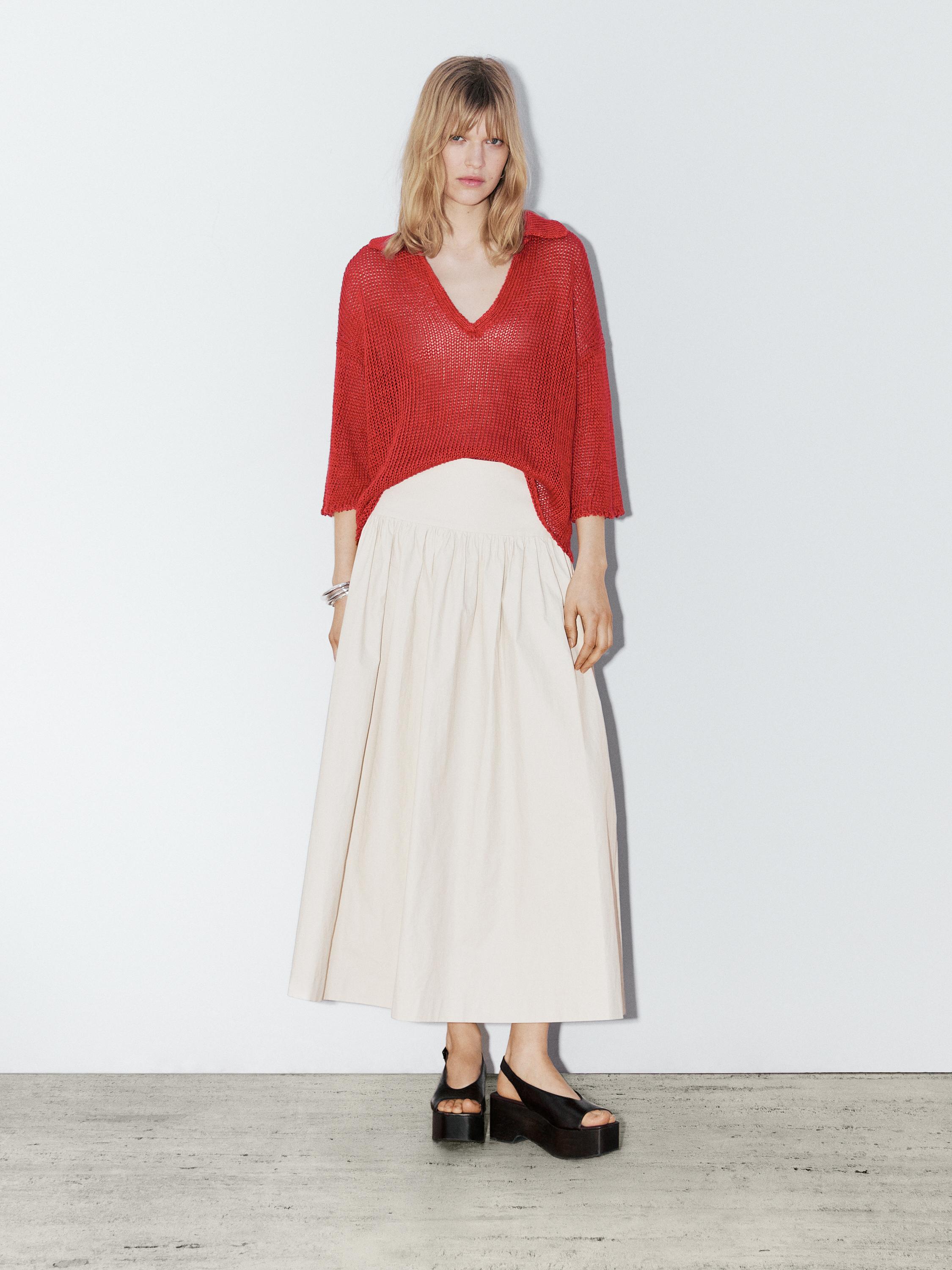 Pullover mit lockerem Strickmuster und Polokragen - Studio