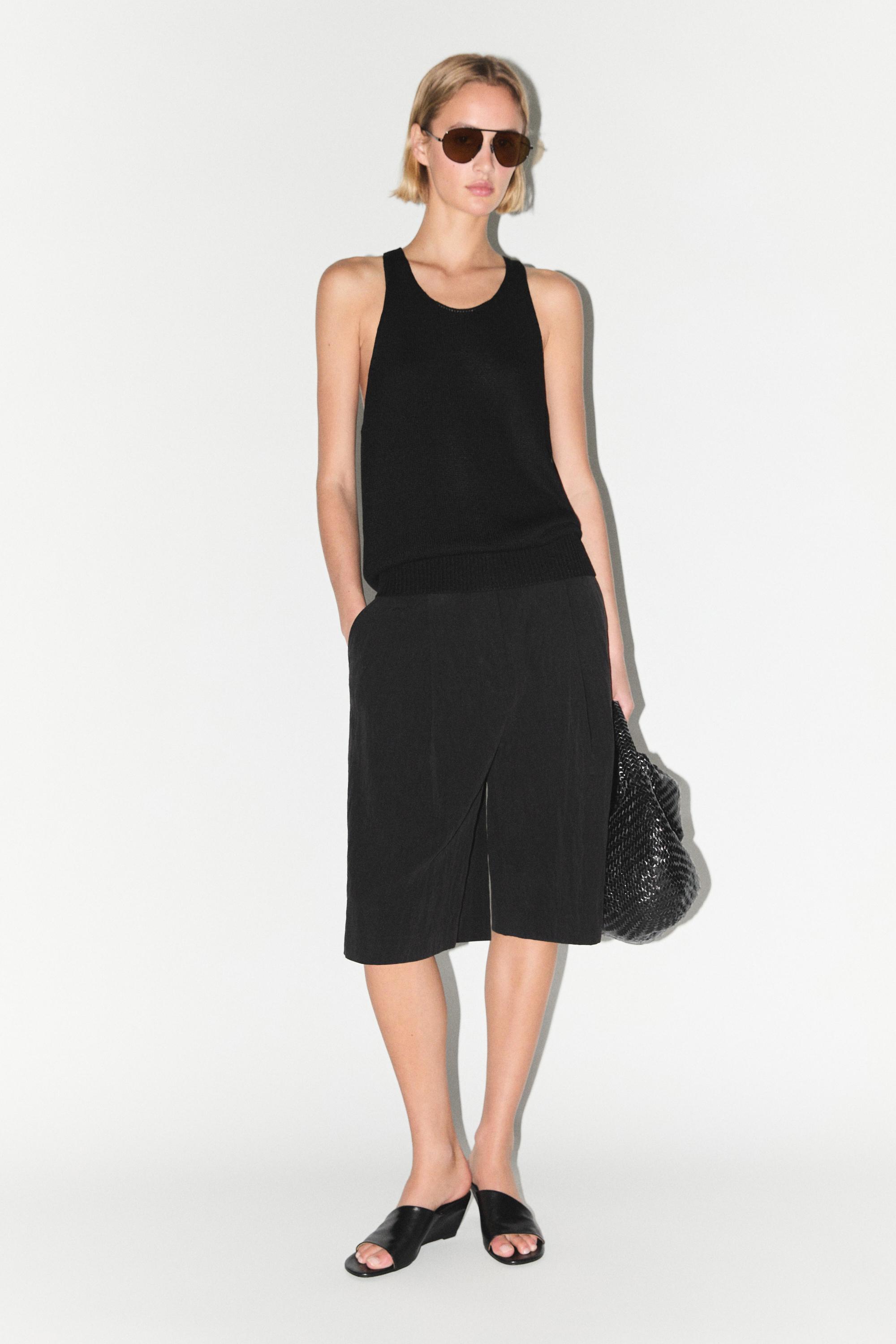 Sleeveless knit halter top — BLACK