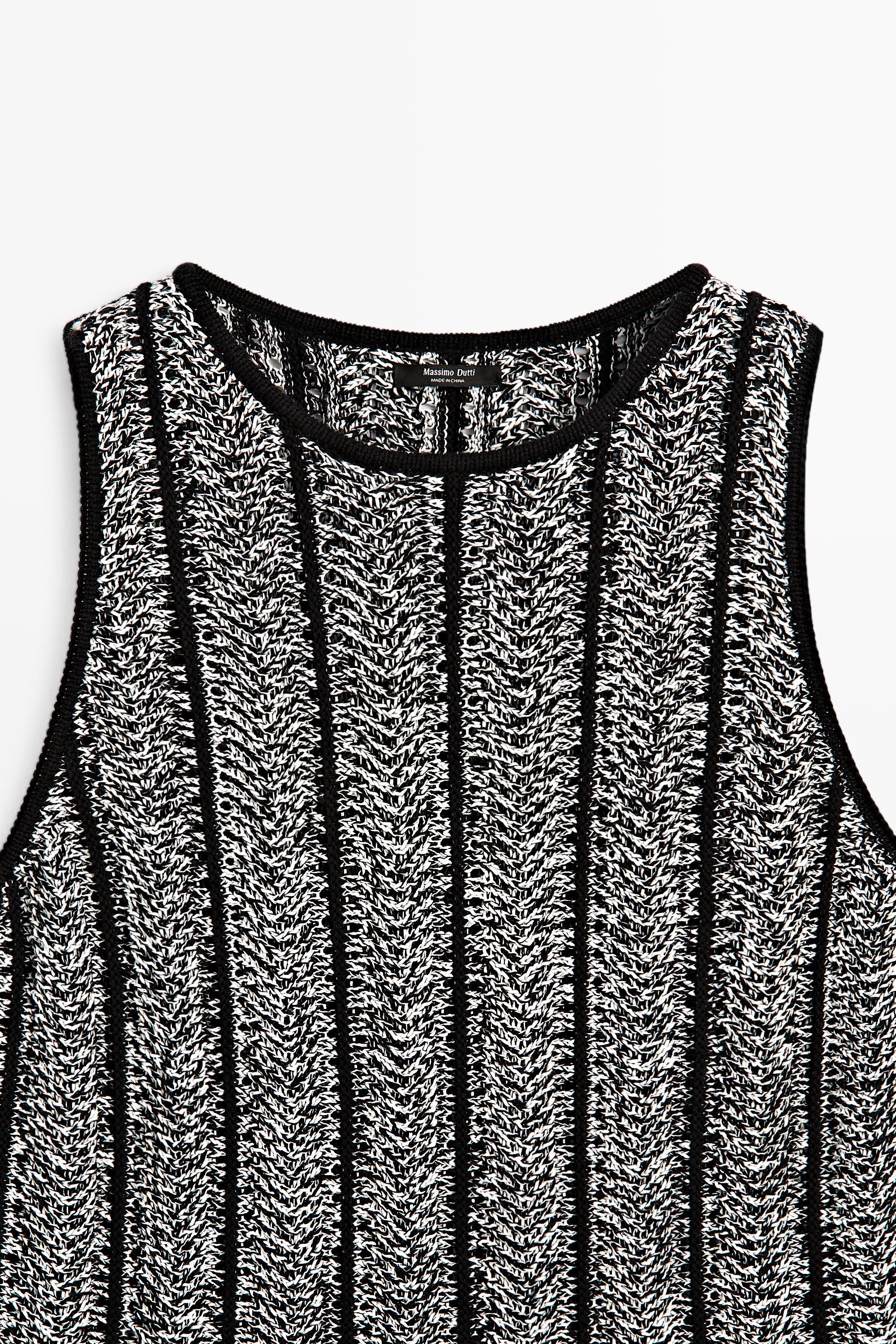 Cotton-blend flecked knit top — BLACK