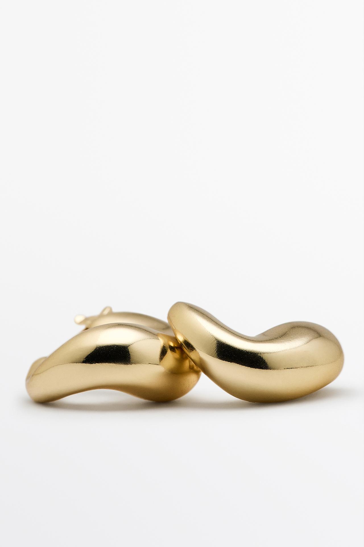 Voluminous hoop earrings — GOLDEN