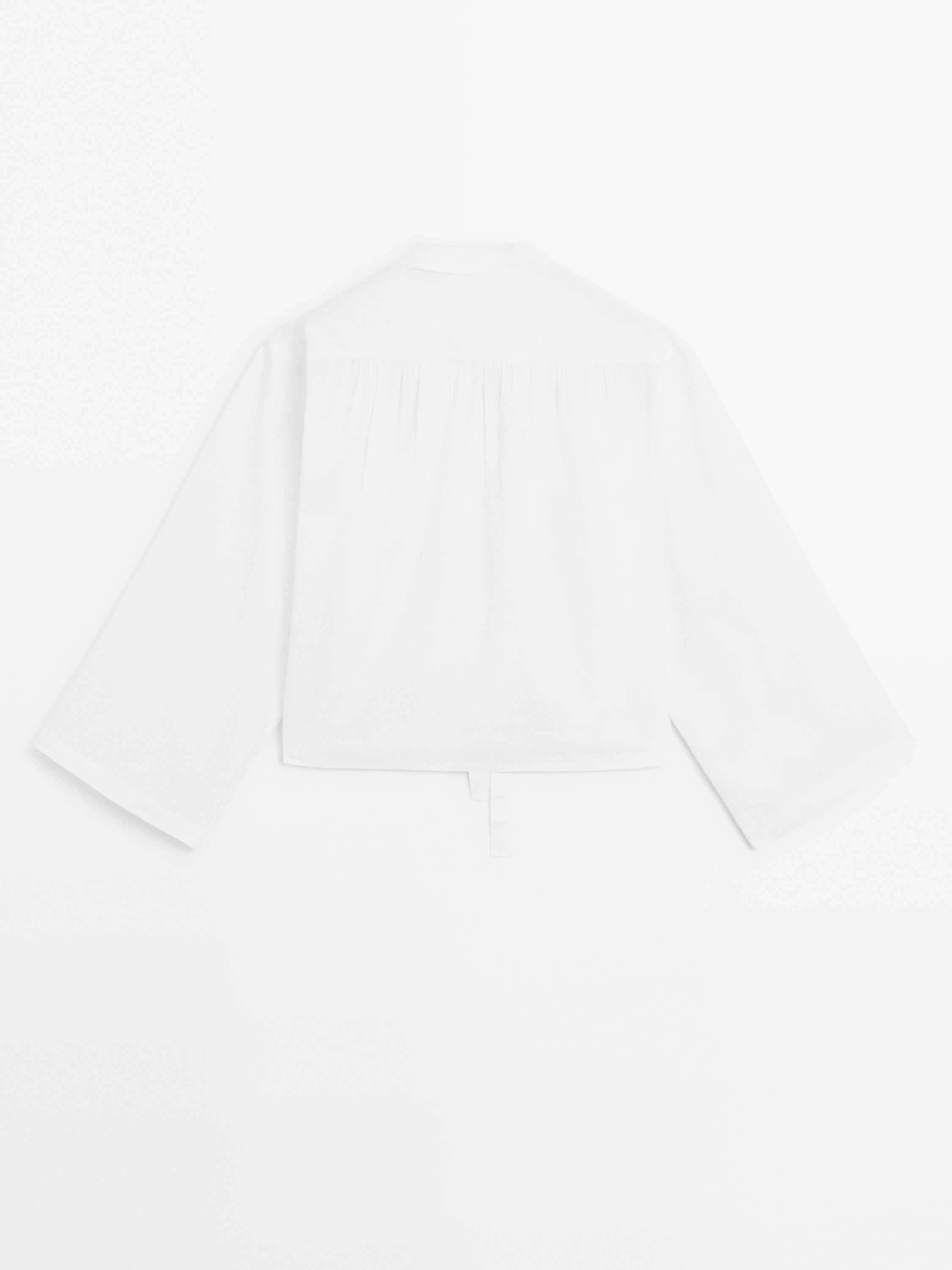 Stand collar blouse with tie detail