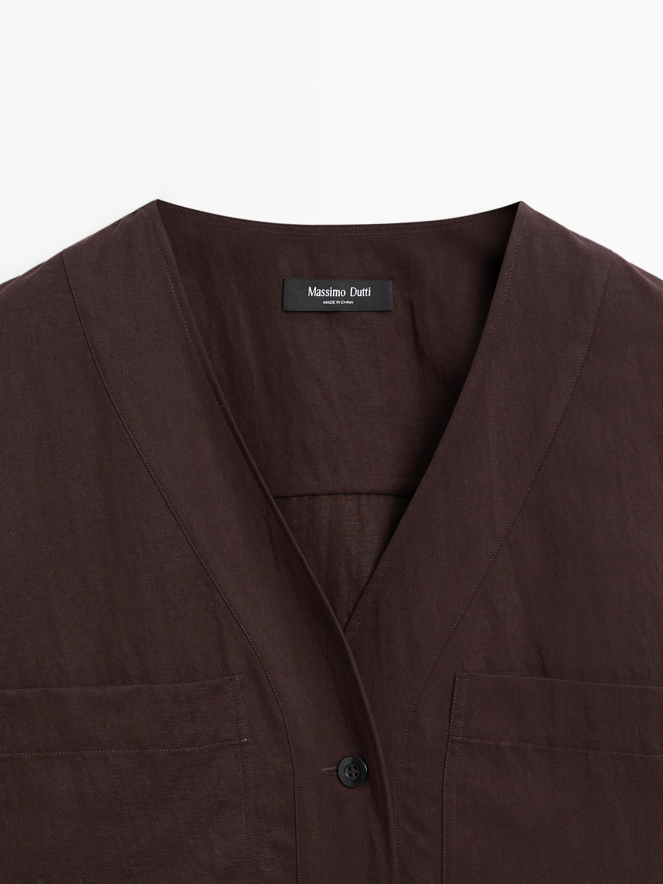 Chemise col V avec poches