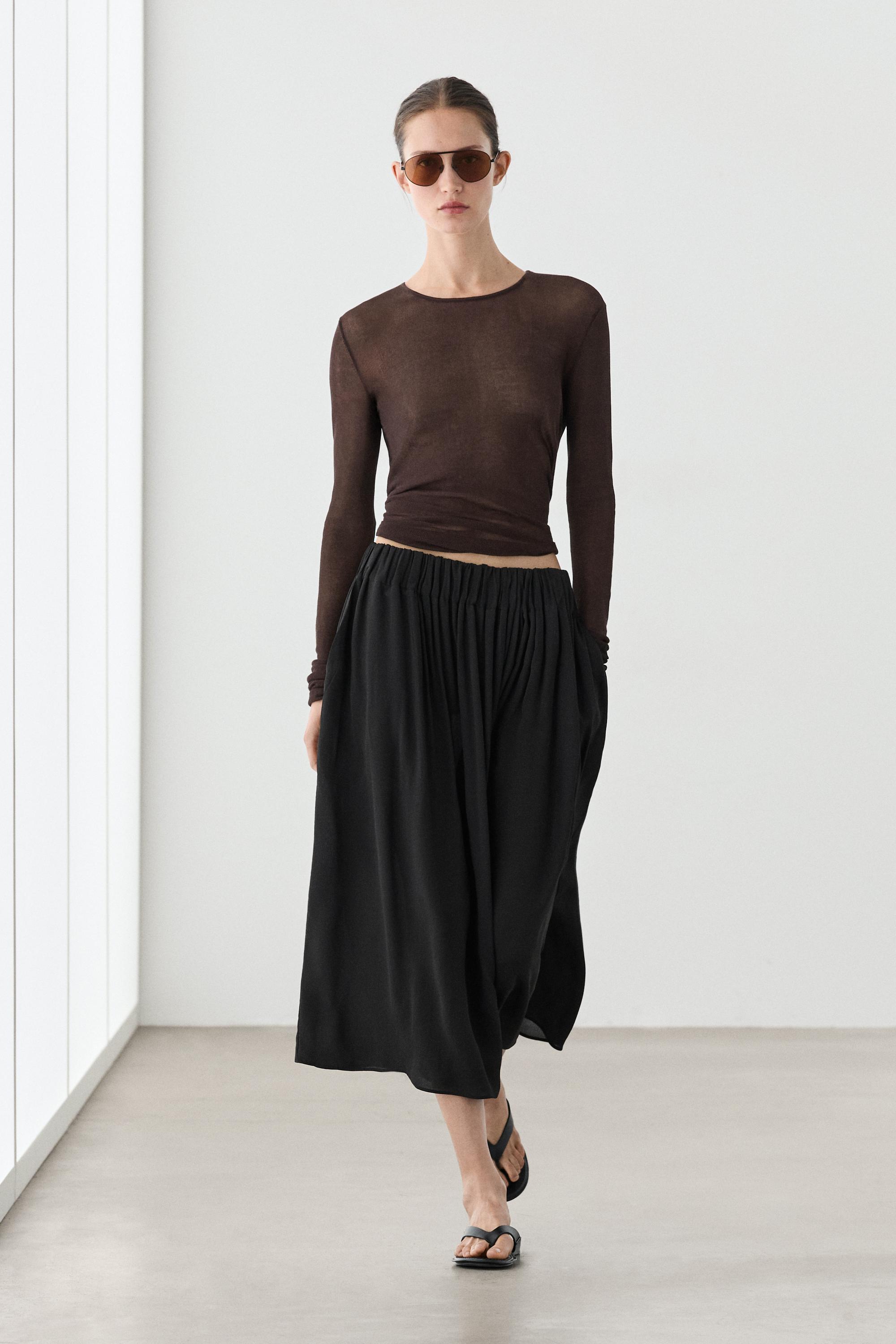 Falda midi plisada