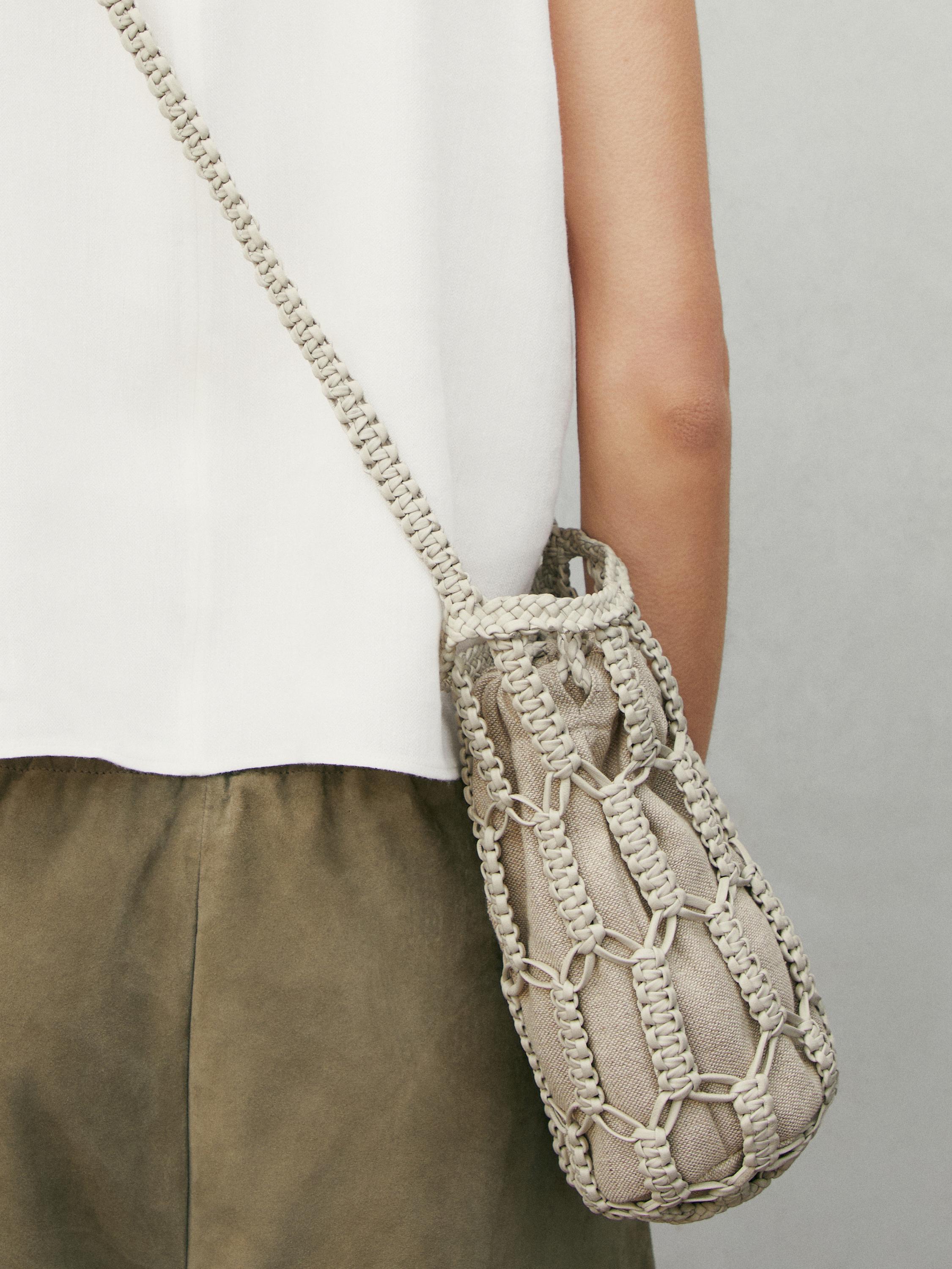 Mini-sac seau tressé en cuir nappa