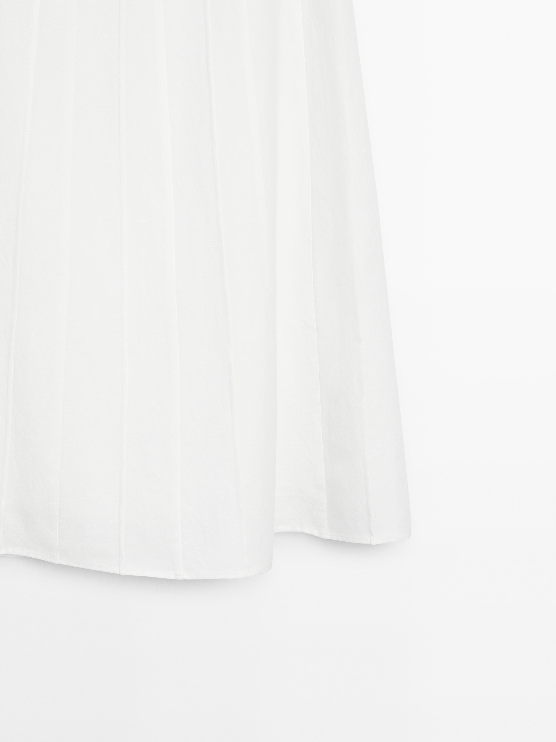 Godet midi skirt with seam details
