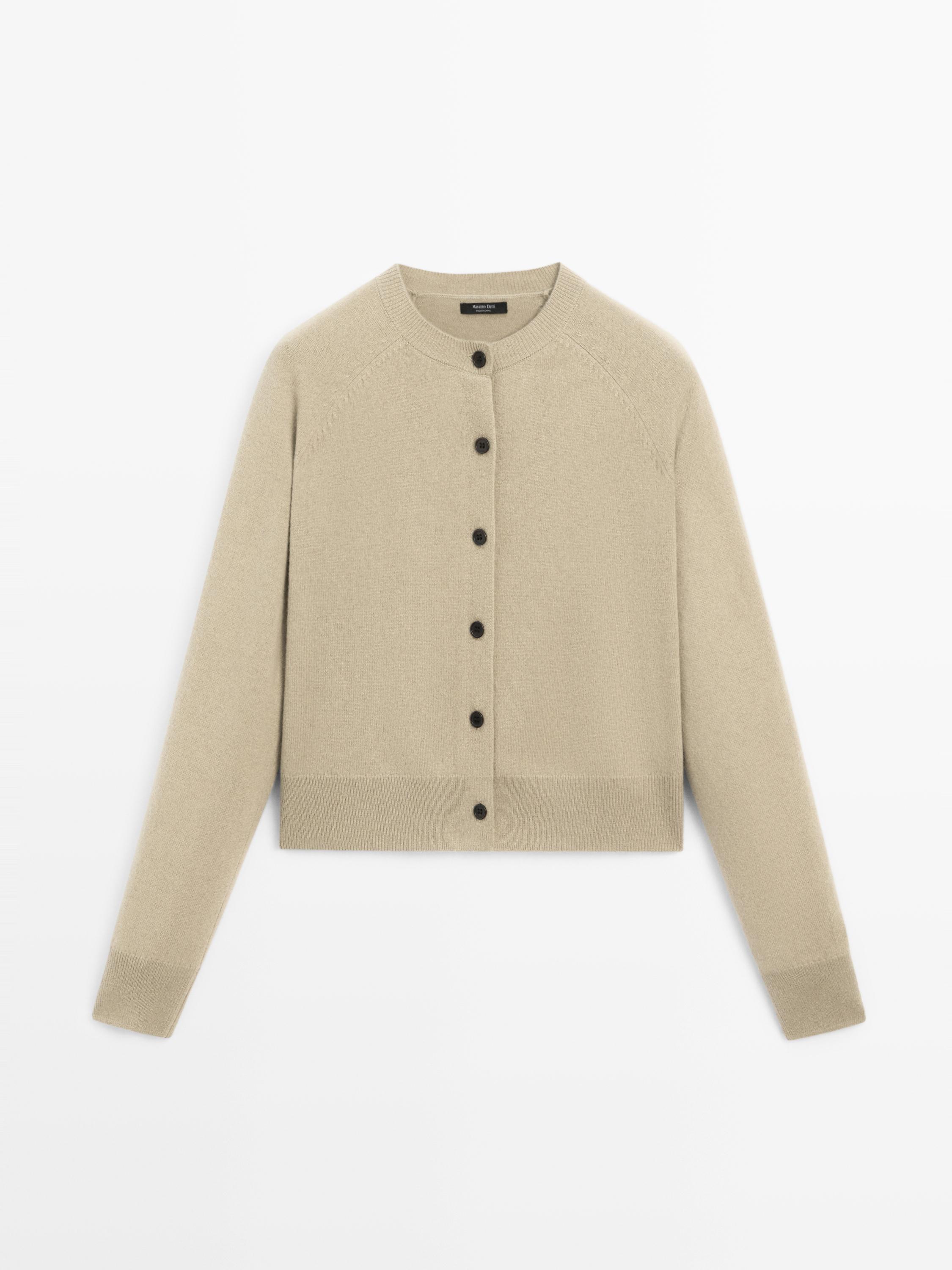 Short knit cardigan with raglan sleeves