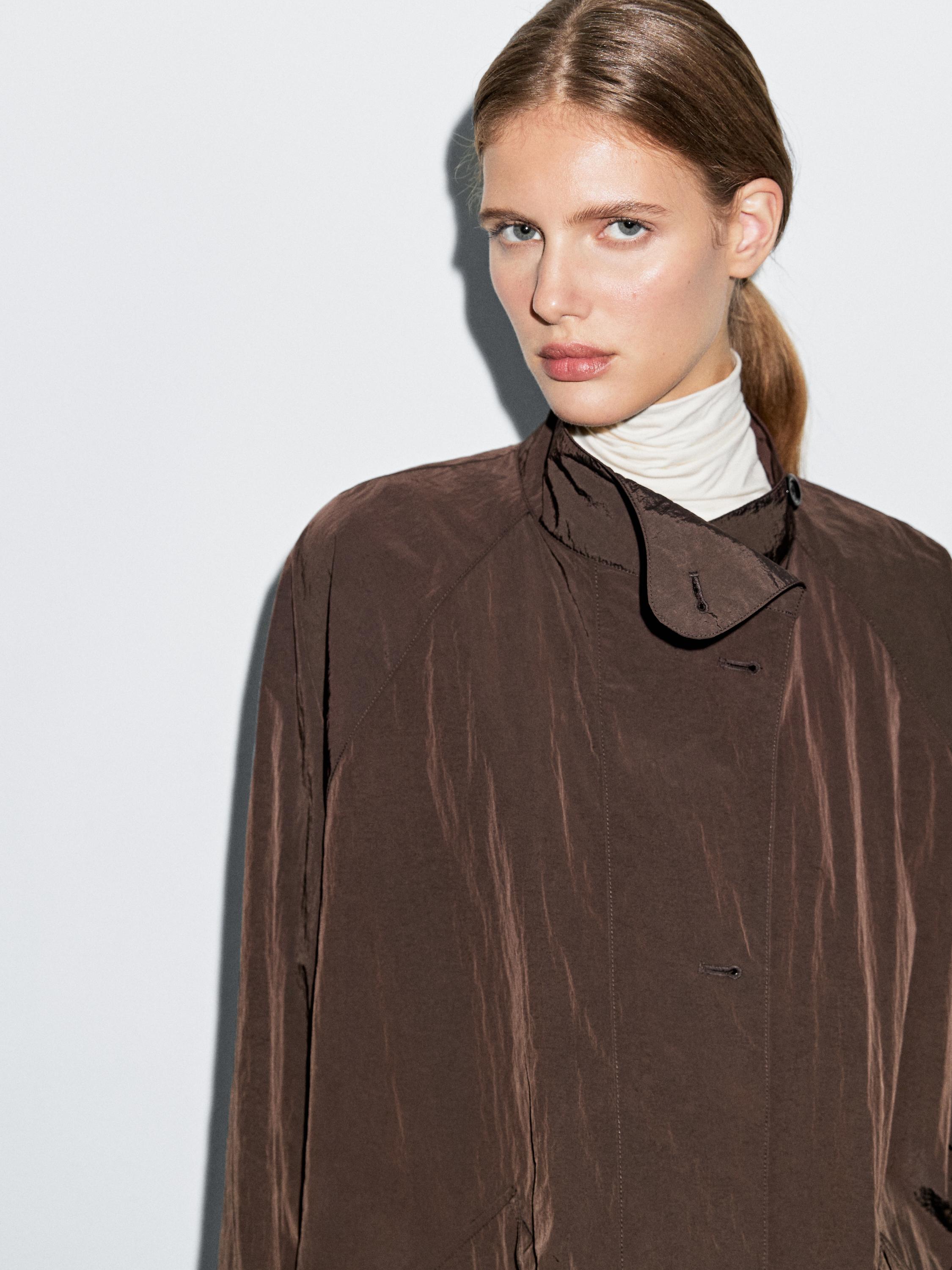 Oversize flowing trench coat in water-repellent fabric