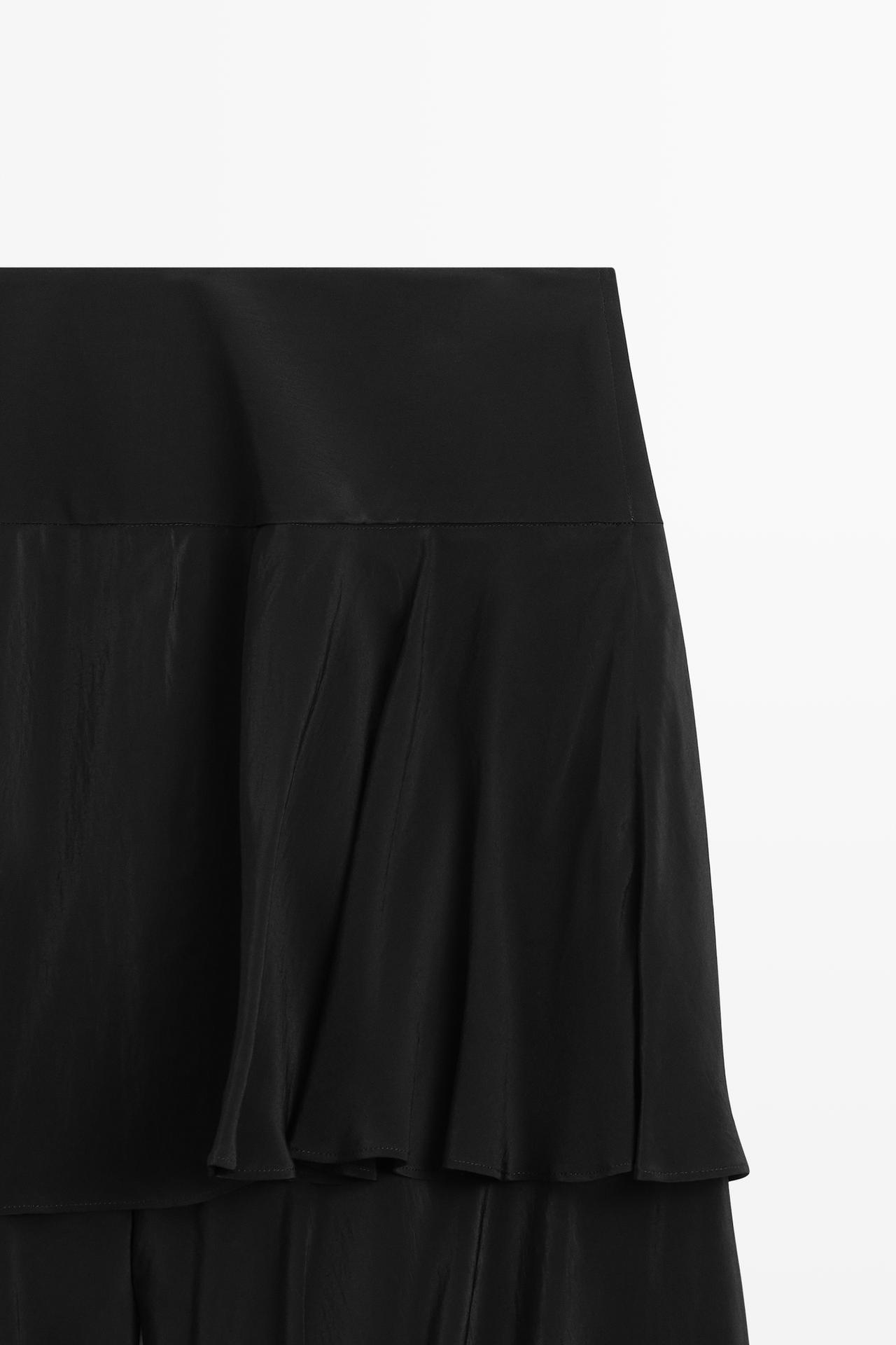 Flowing skort with ruffle detail — BLACK